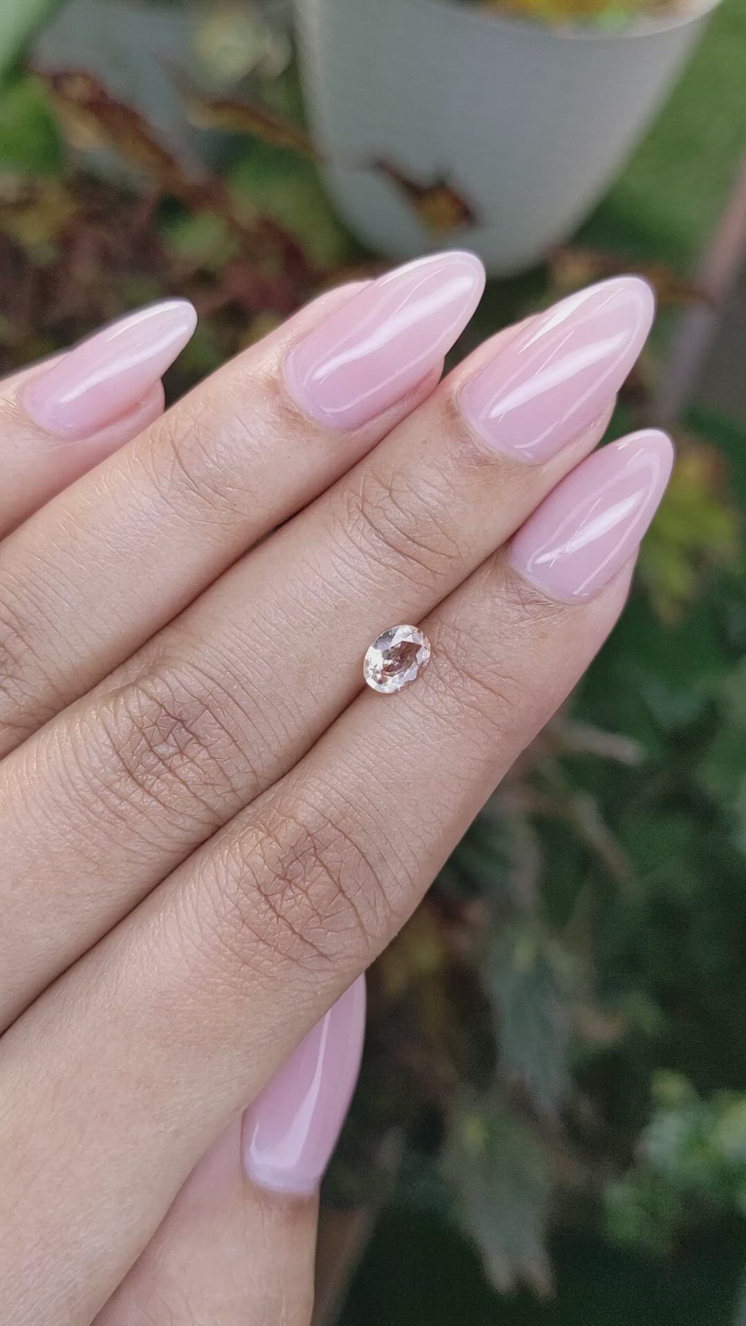 0.59 Ct. Peach Sapphire from Ceylon (Sri Lanka) Size Video