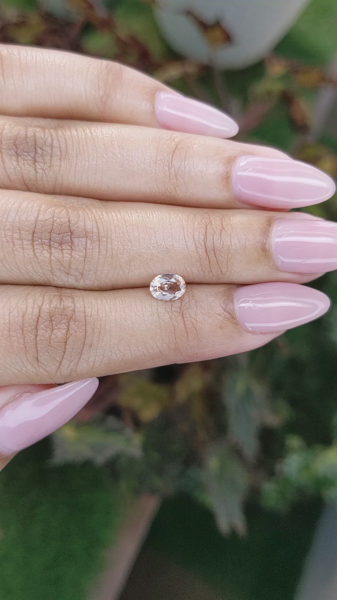 0.59 Ct. Peach Sapphire from Ceylon (Sri Lanka) Size Video