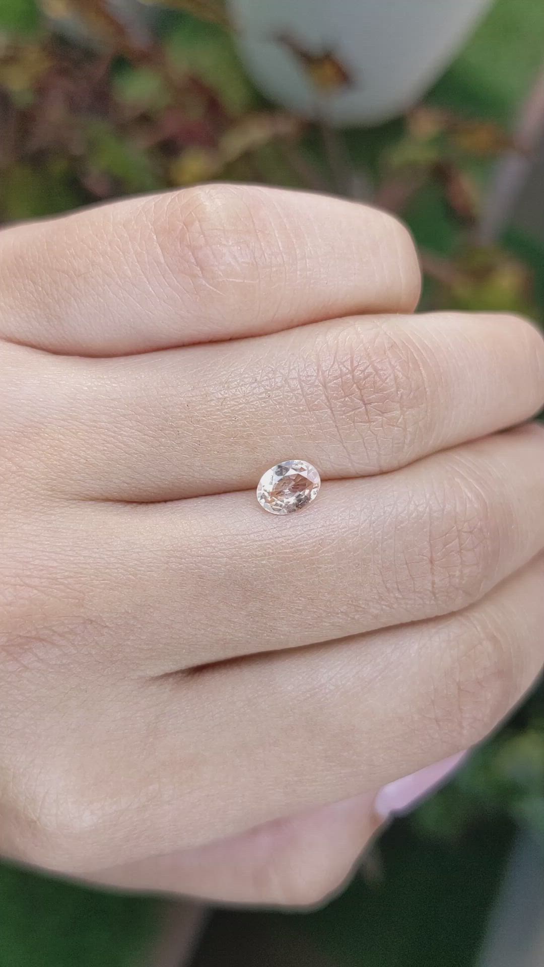 0.59 Ct. Peach Sapphire from Ceylon (Sri Lanka) Size Video