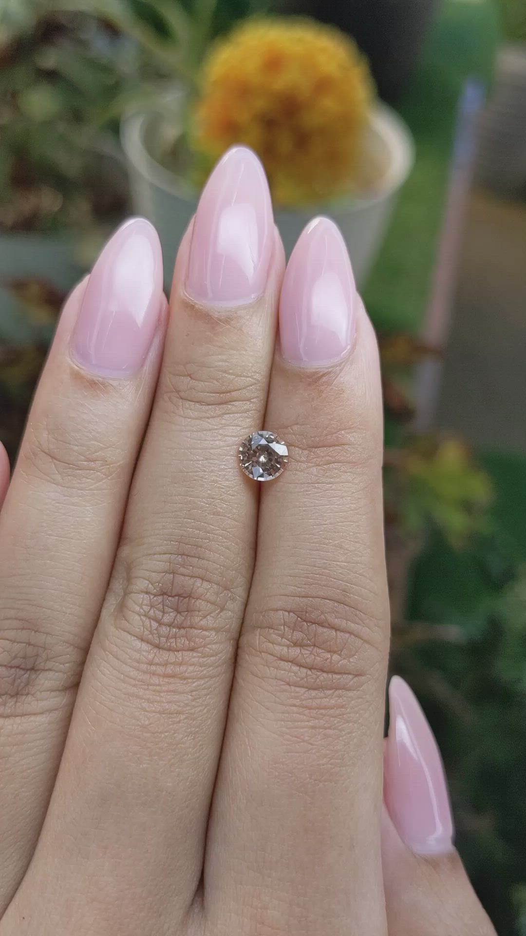 0.82 Ct. Peach Sapphire from Ceylon (Sri Lanka) Size Video