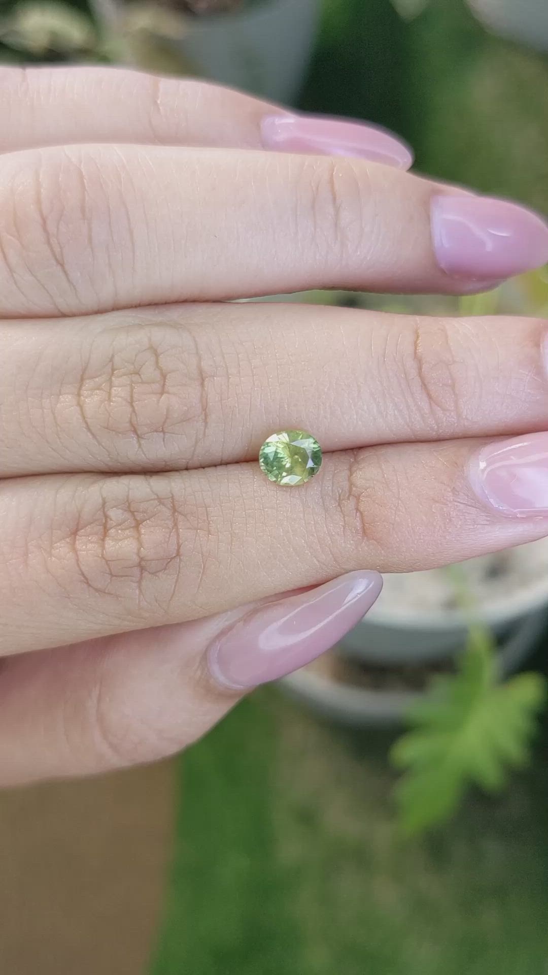 0.93 Ct. Yellowish Green Sapphire from Ceylon (Sri Lanka) Size Video