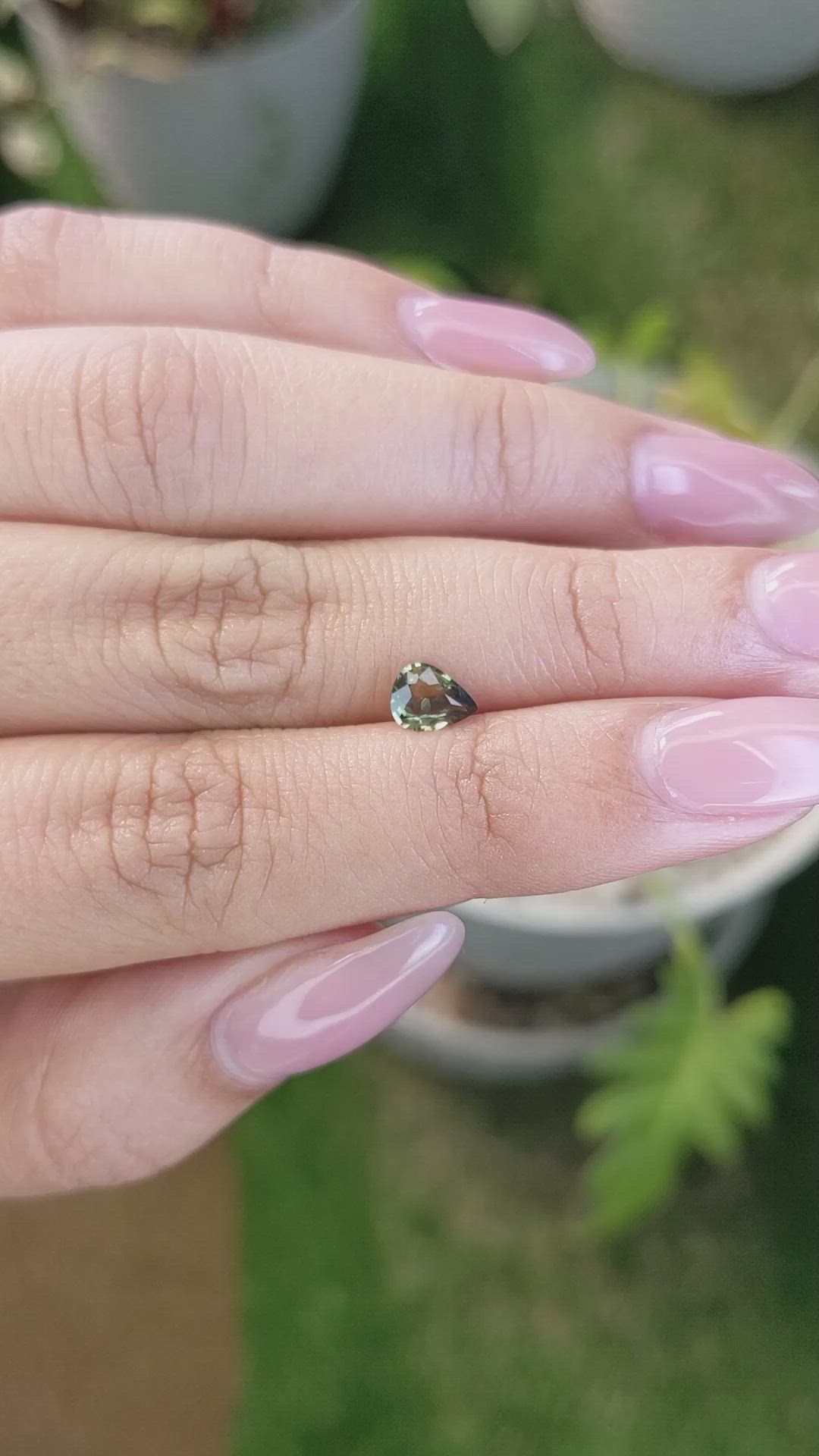 0.60 Ct. Yellowish Green Sapphire from Madagascar Size Video