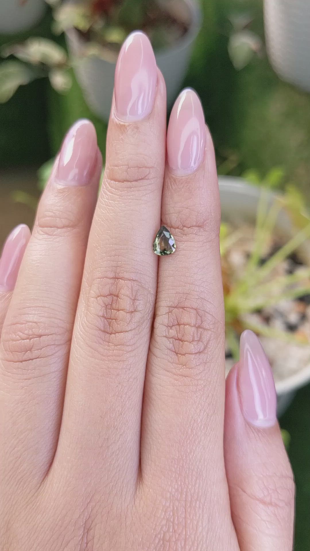 0.60 Ct. Yellowish Green Sapphire from Madagascar Size Video