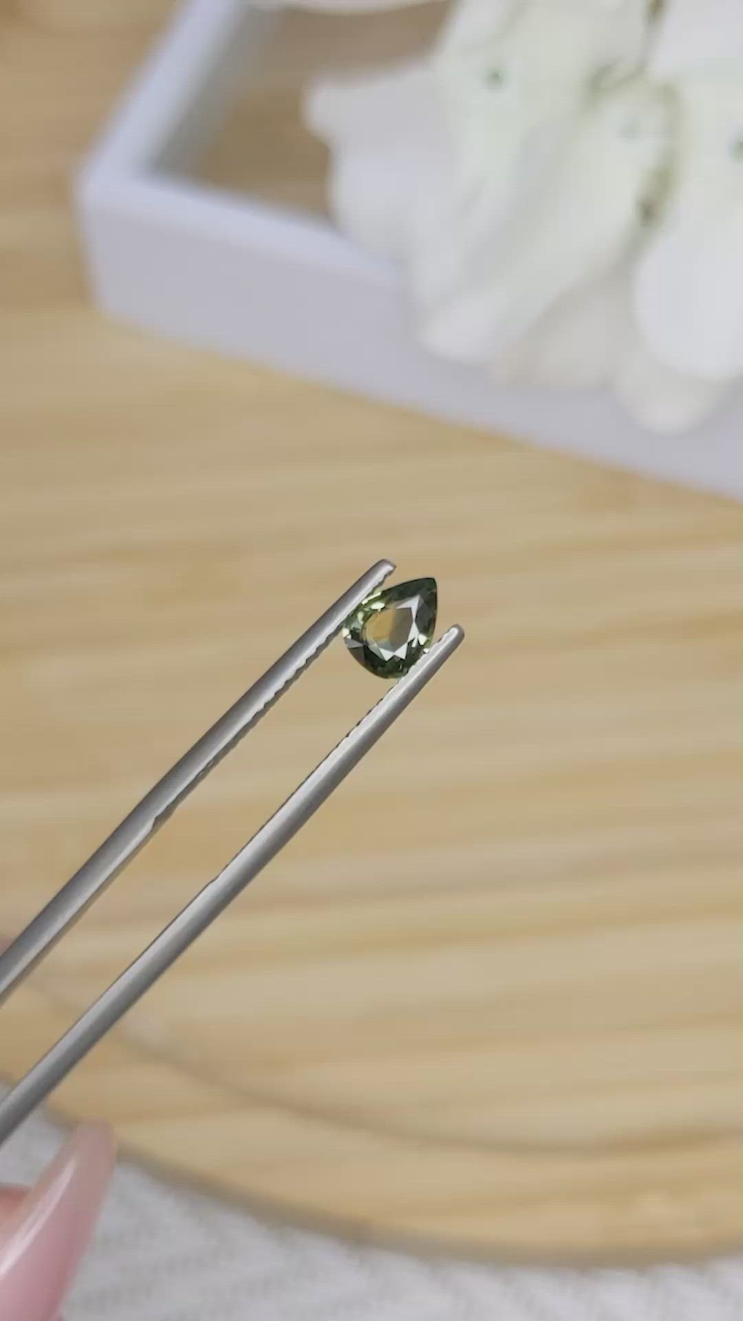 0.60 Ct. Yellowish Green Sapphire from Madagascar Size Video
