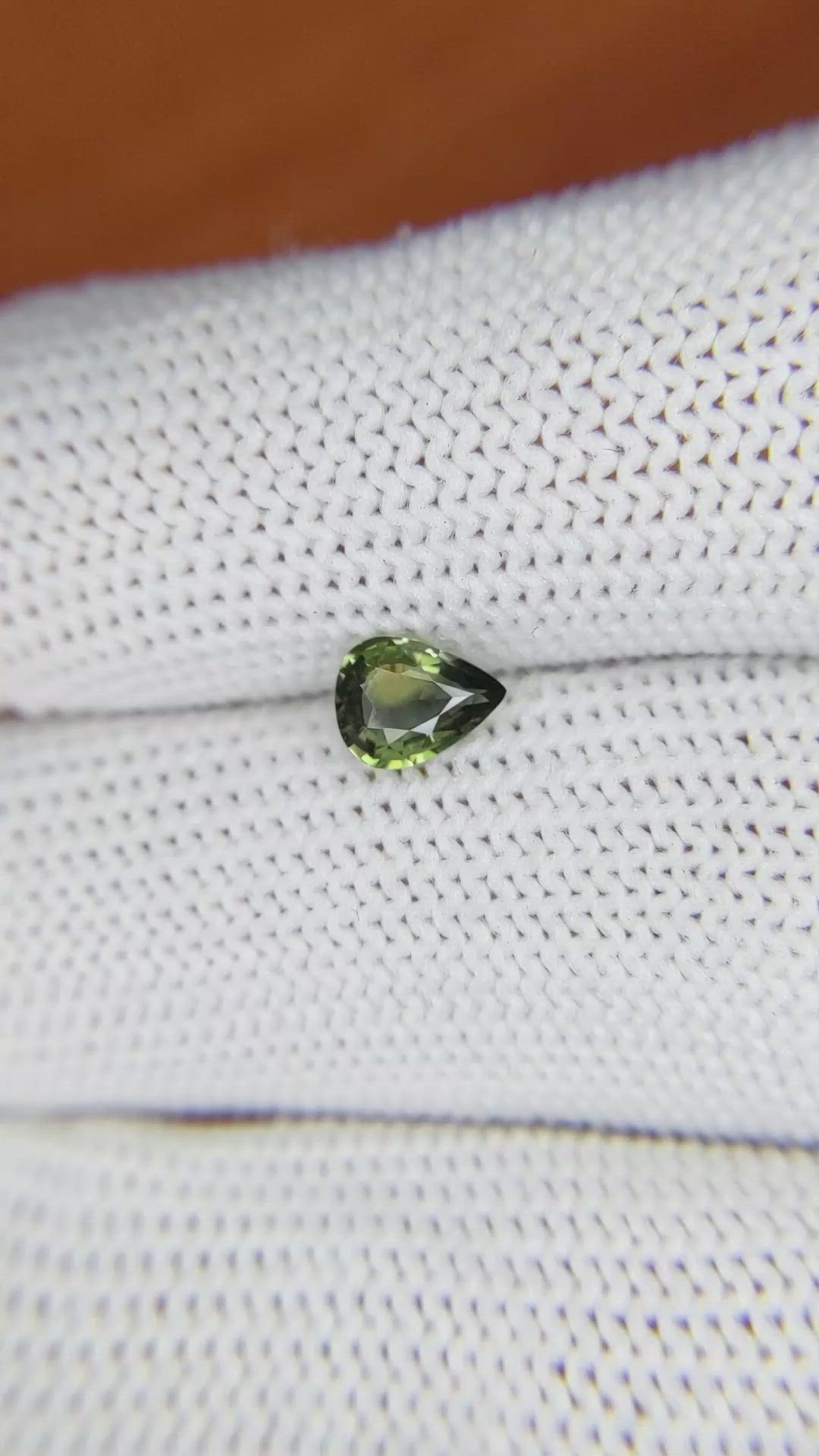 0.60 Ct. Yellowish Green Sapphire from Madagascar Size Video