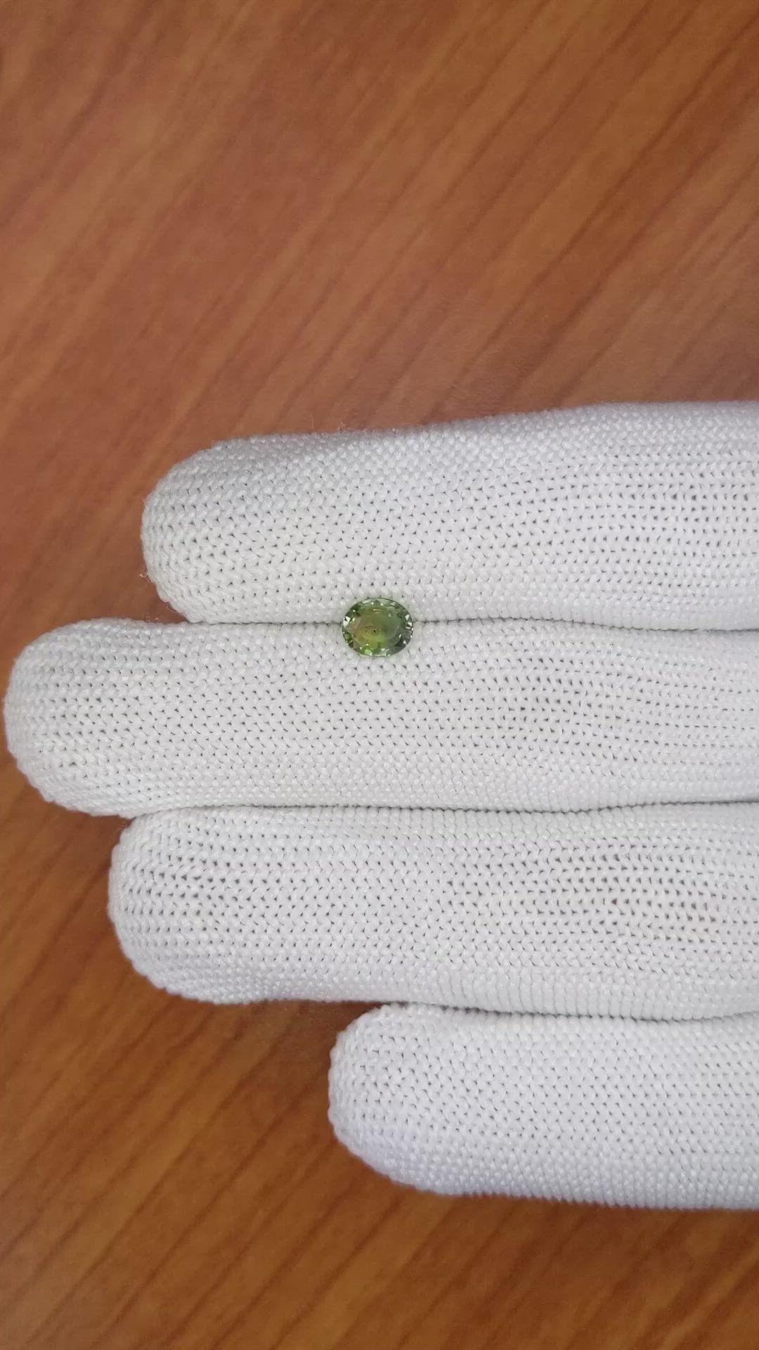 0.75 Ct. Yellowish Green Sapphire from Madagascar Size Video