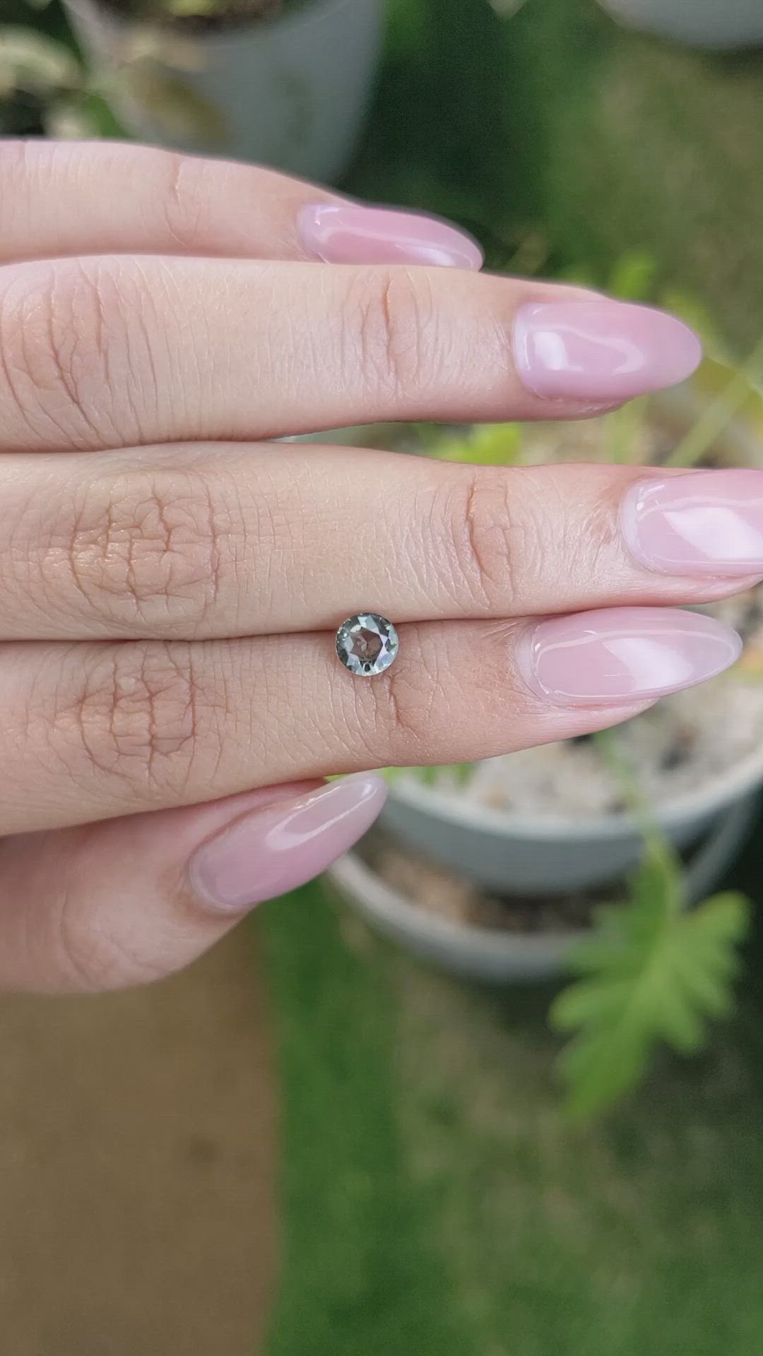 0.73 Ct. Brownish Green Sapphire from Madagascar Size Video