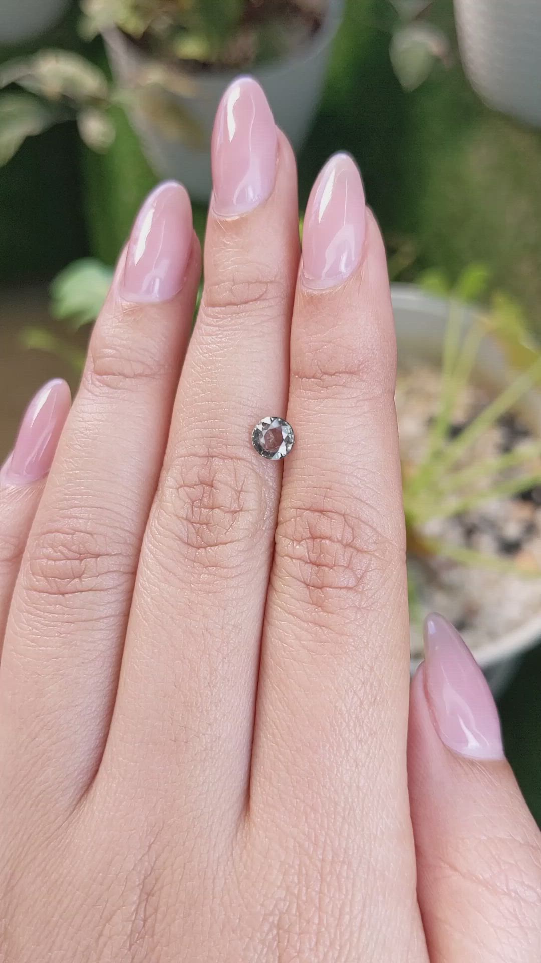 0.73 Ct. Brownish Green Sapphire from Madagascar Size Video