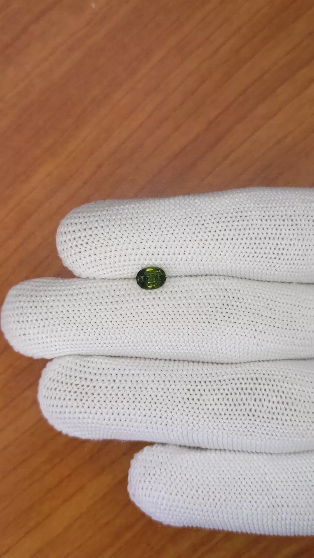 0.65 Ct. Yellowish Green Sapphire from Madagascar Size Video