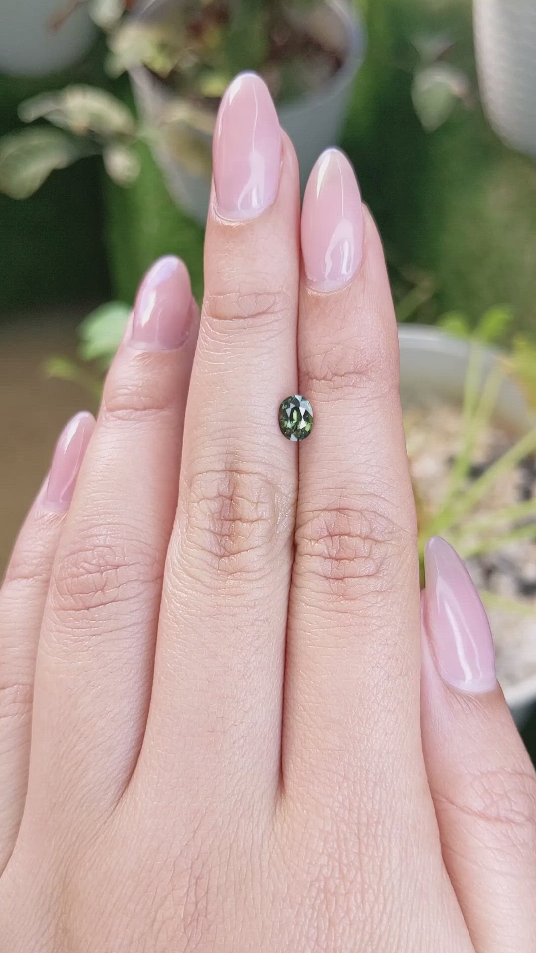 0.65 Ct. Yellowish Green Sapphire from Madagascar Size Video