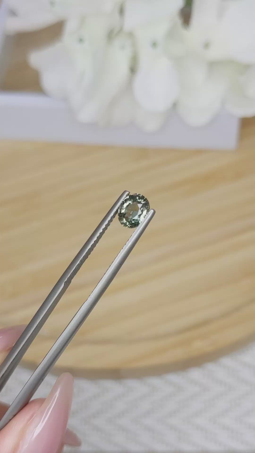 0.84 Ct. Brownish Green Sapphire from Madagascar Size Video