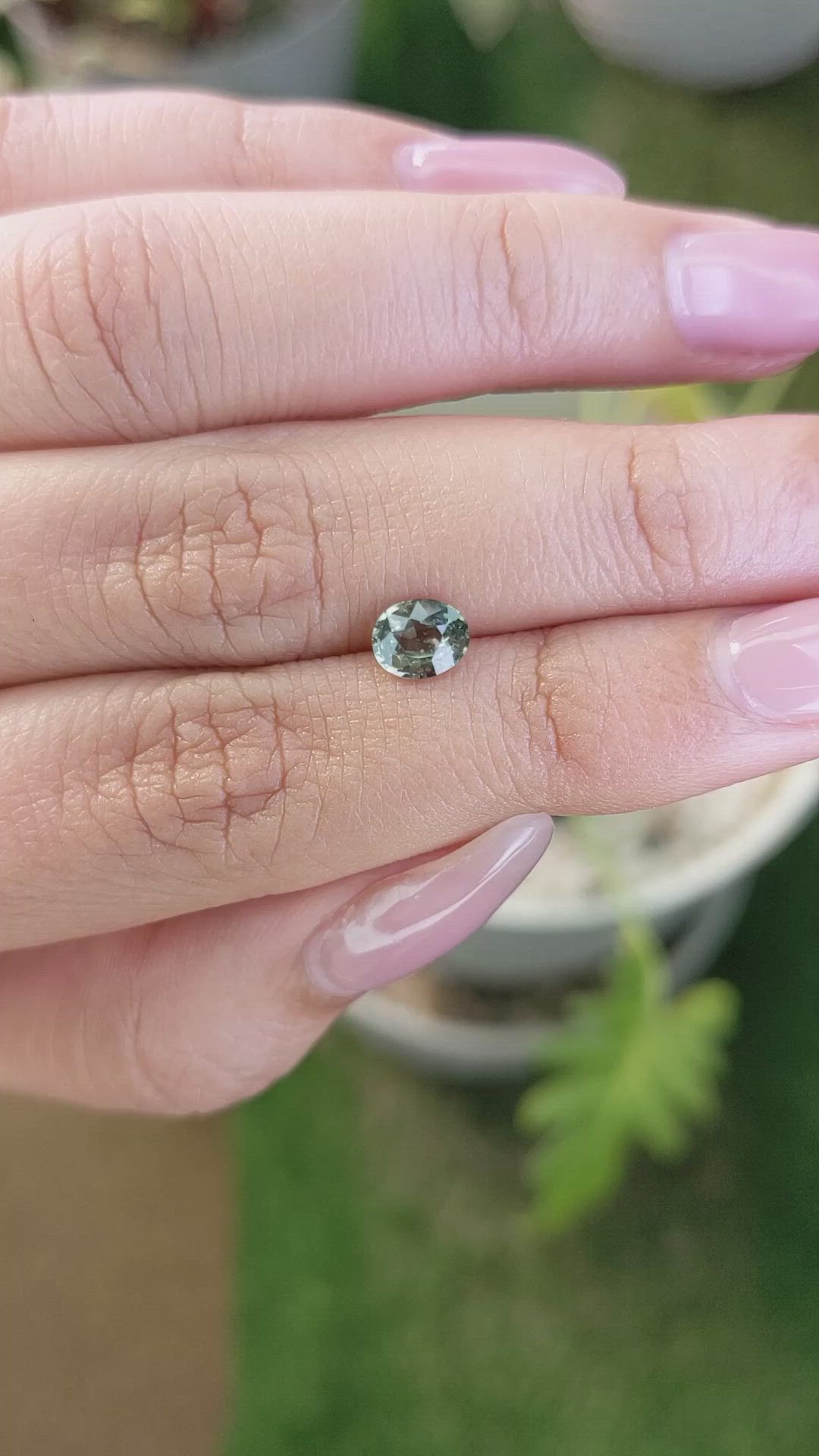 0.84 Ct. Brownish Green Sapphire from Madagascar Size Video