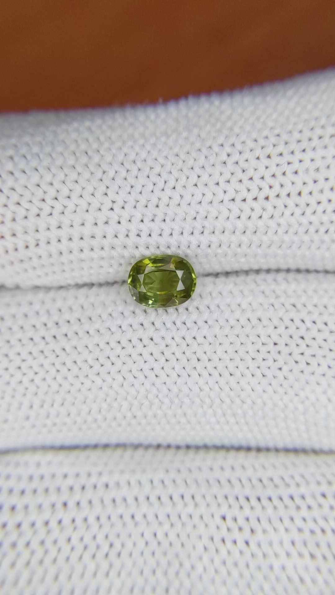 0.83 Ct. Greenish Yellow Sapphire from Madagascar Size Video