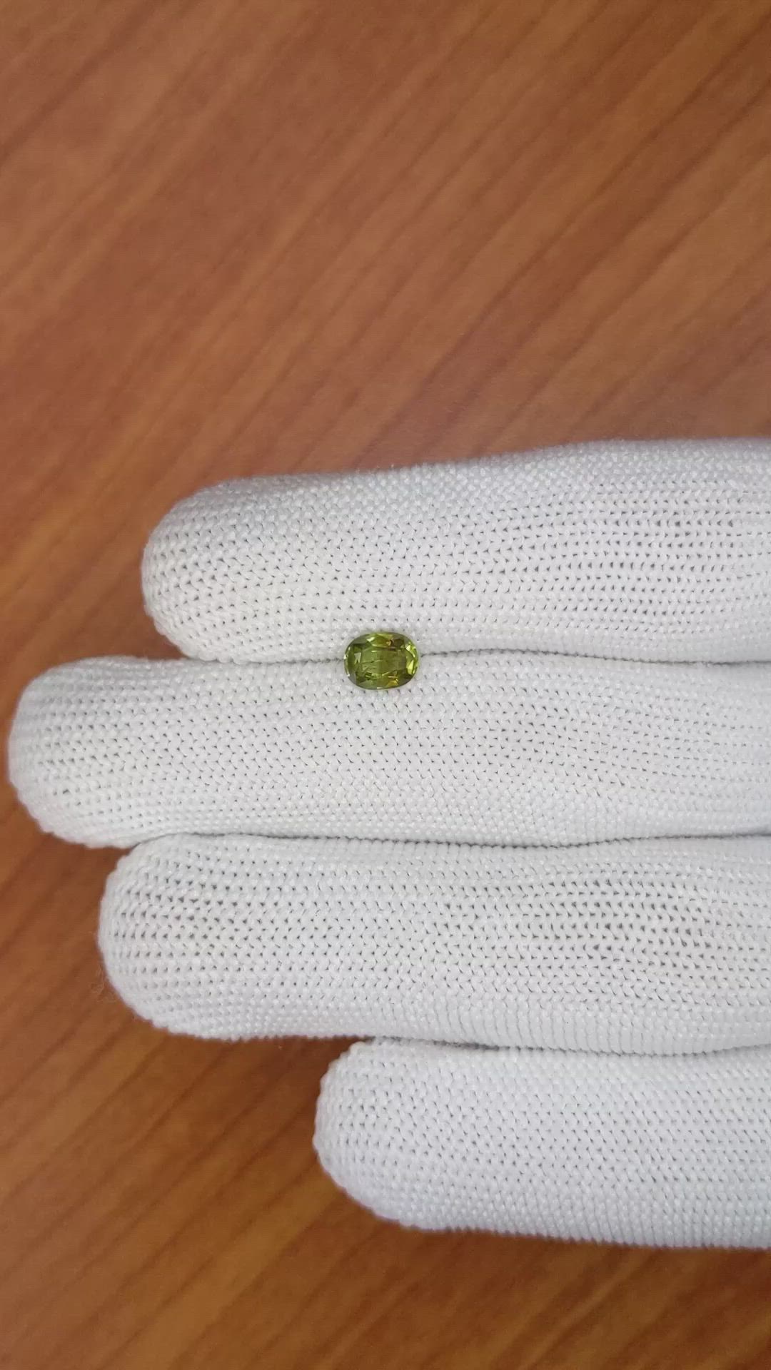 0.83 Ct. Greenish Yellow Sapphire from Madagascar Size Video