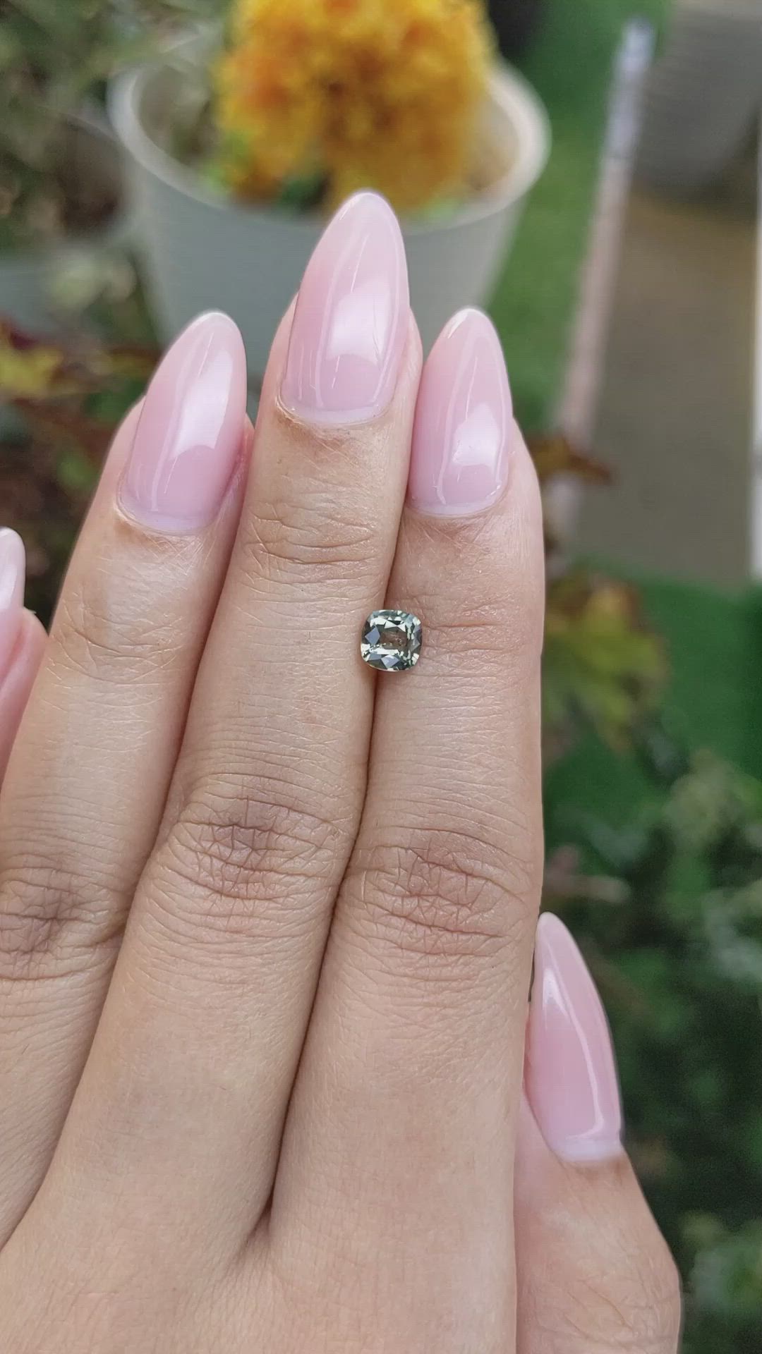 0.70 Ct. Yellowish Green Sapphire from Madagascar Size Video