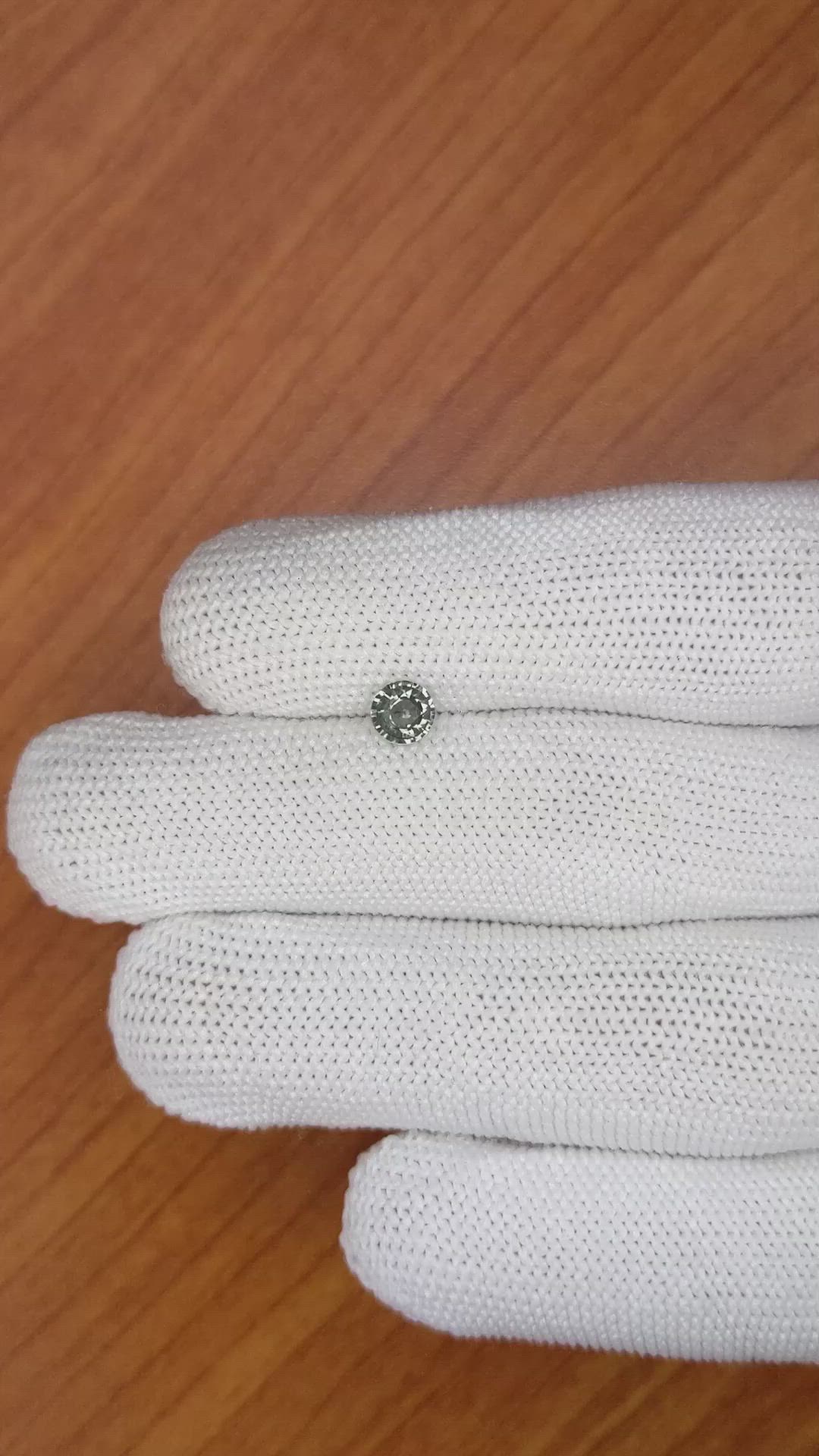 0.59 Ct. Green Sapphire from Madagascar Size Video