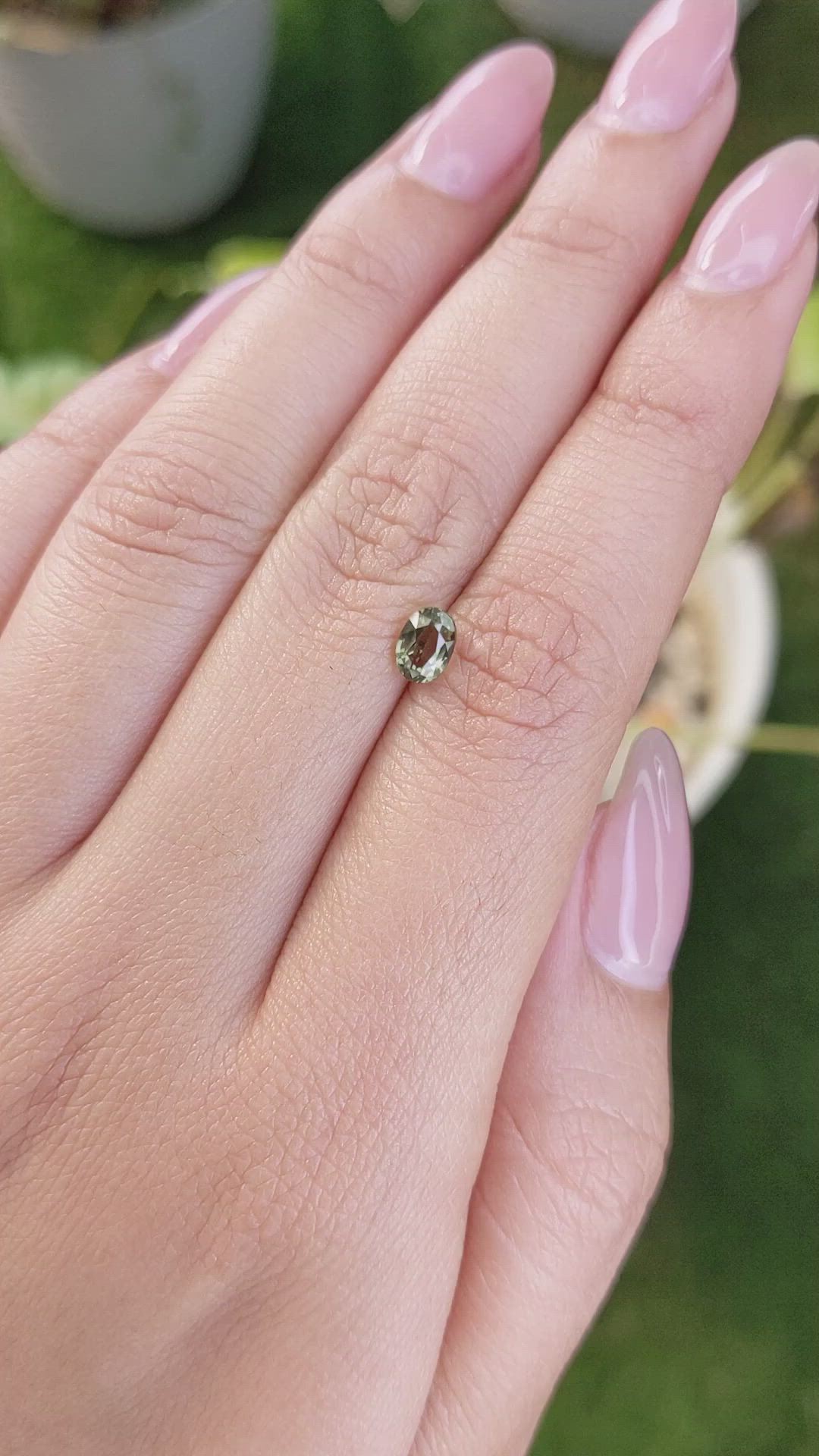 0.76 Ct. Yellowish Green Sapphire from Madagascar Size Video