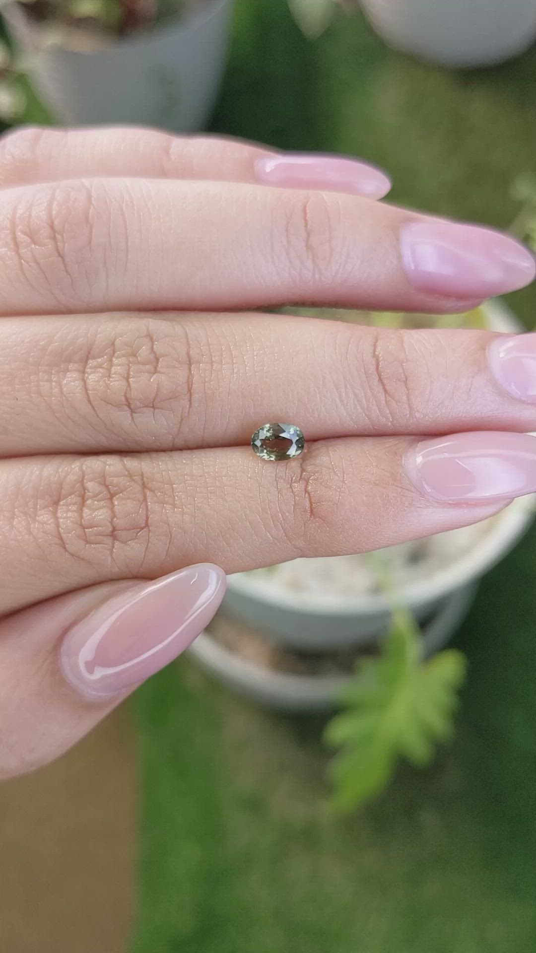 0.76 Ct. Yellowish Green Sapphire from Madagascar Size Video