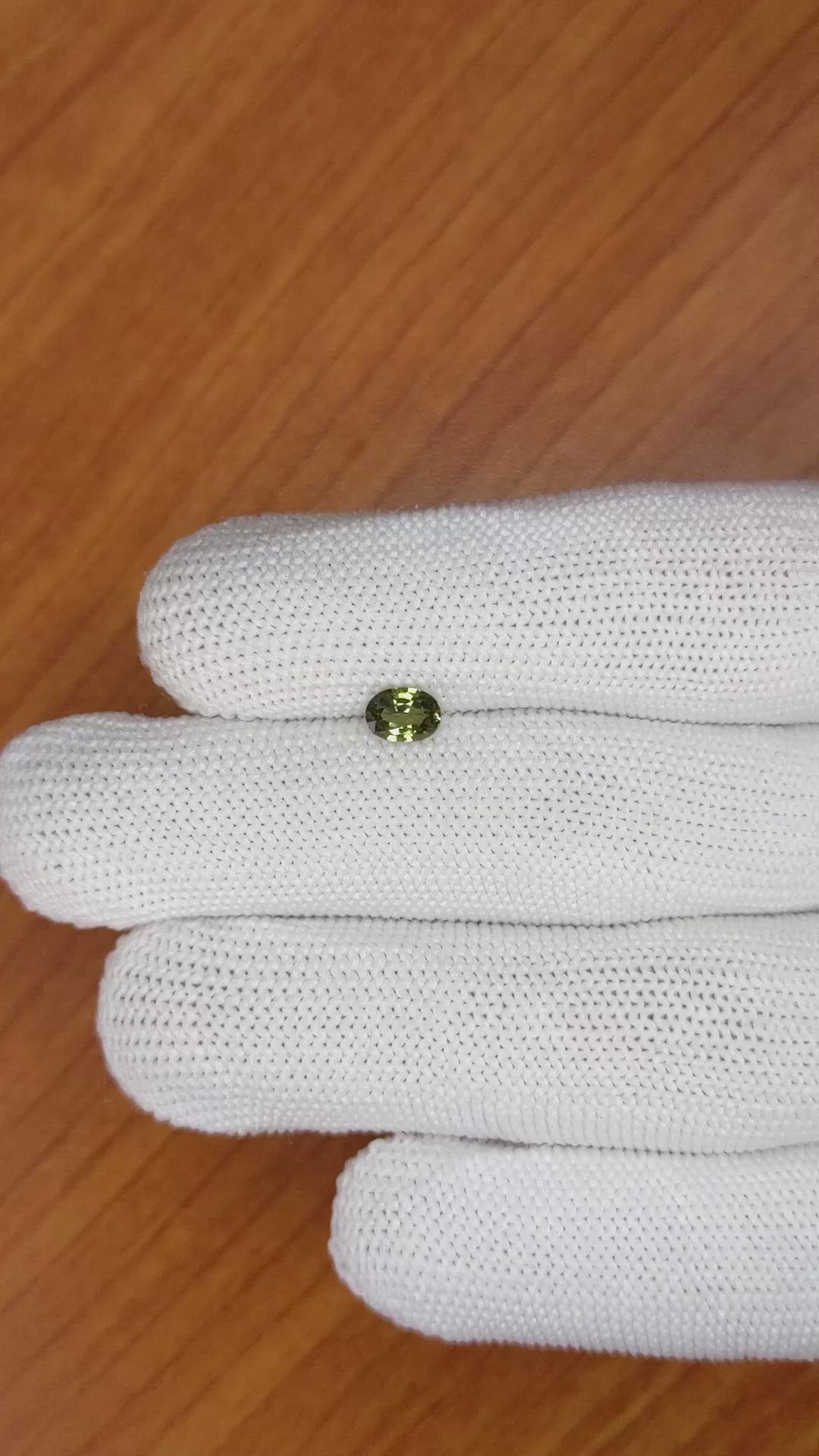 0.76 Ct. Yellowish Green Sapphire from Madagascar Size Video