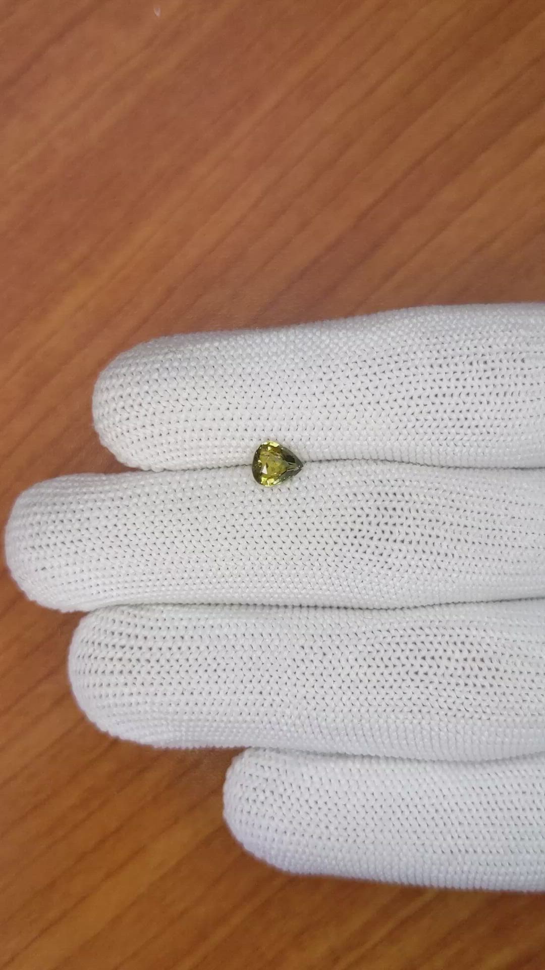 0.70 Ct. Yellowish Brown Sapphire from Madagascar Size Video