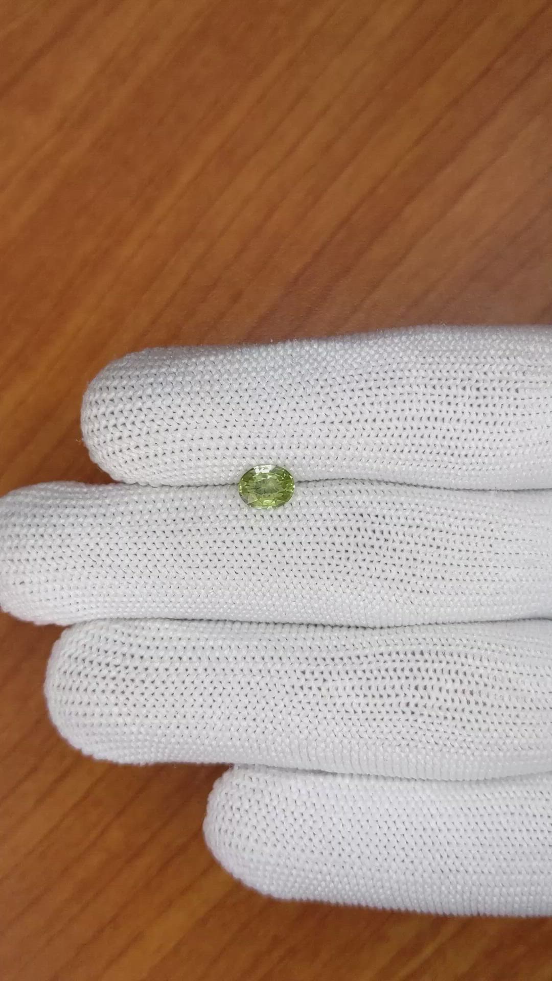 0.80 Ct. Yellowish Green Sapphire from Madagascar Size Video
