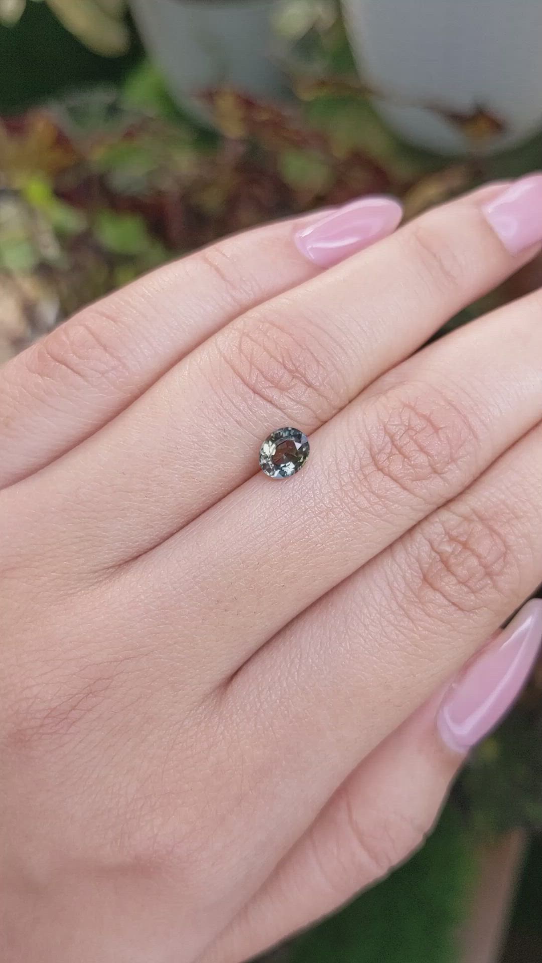 0.88 Ct. Yellowish Green Sapphire from Madagascar Size Video