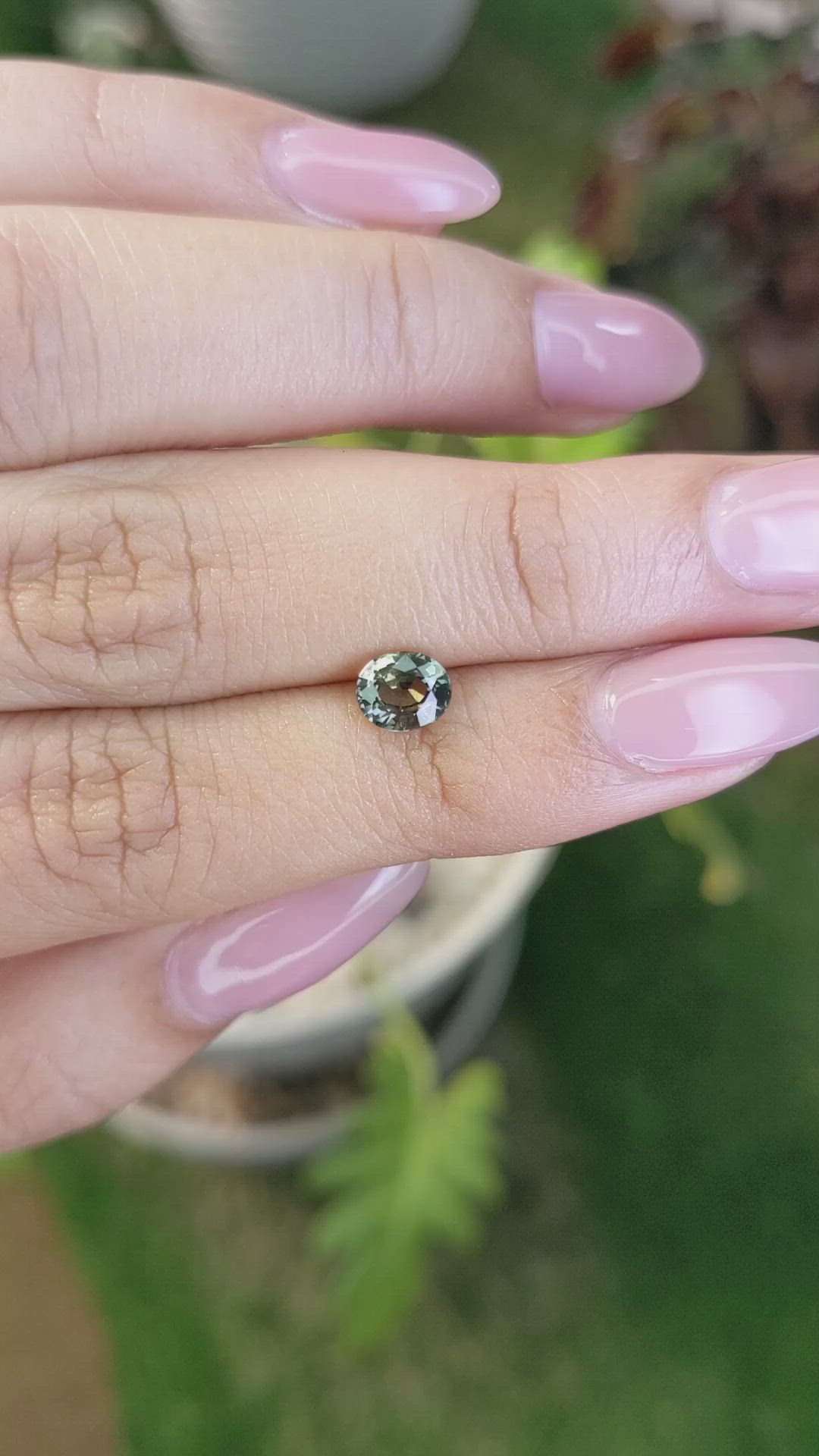 0.88 Ct. Yellowish Green Sapphire from Madagascar Size Video