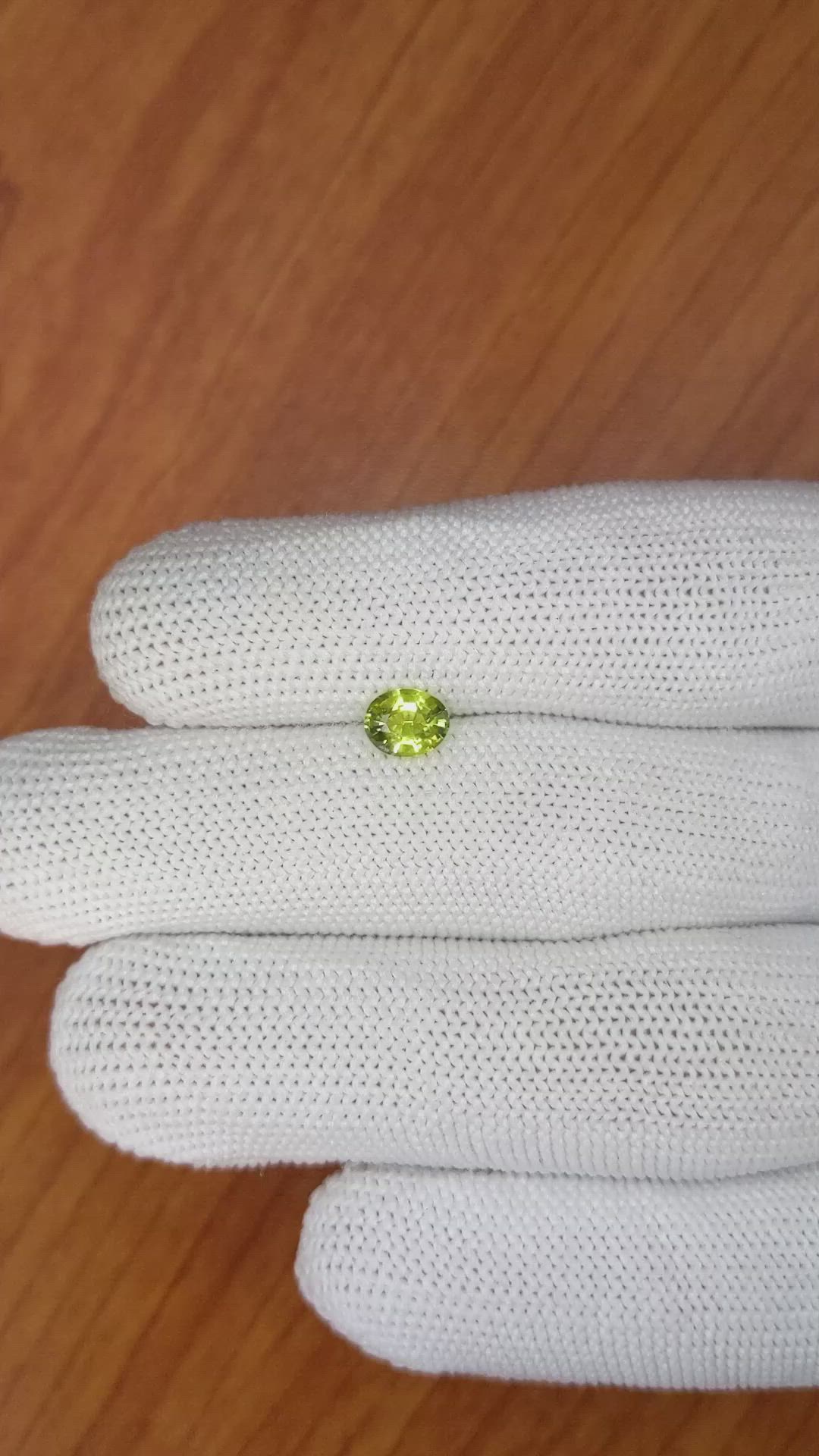 0.82 Ct. Greenish Yellow Sapphire from Madagascar Size Video