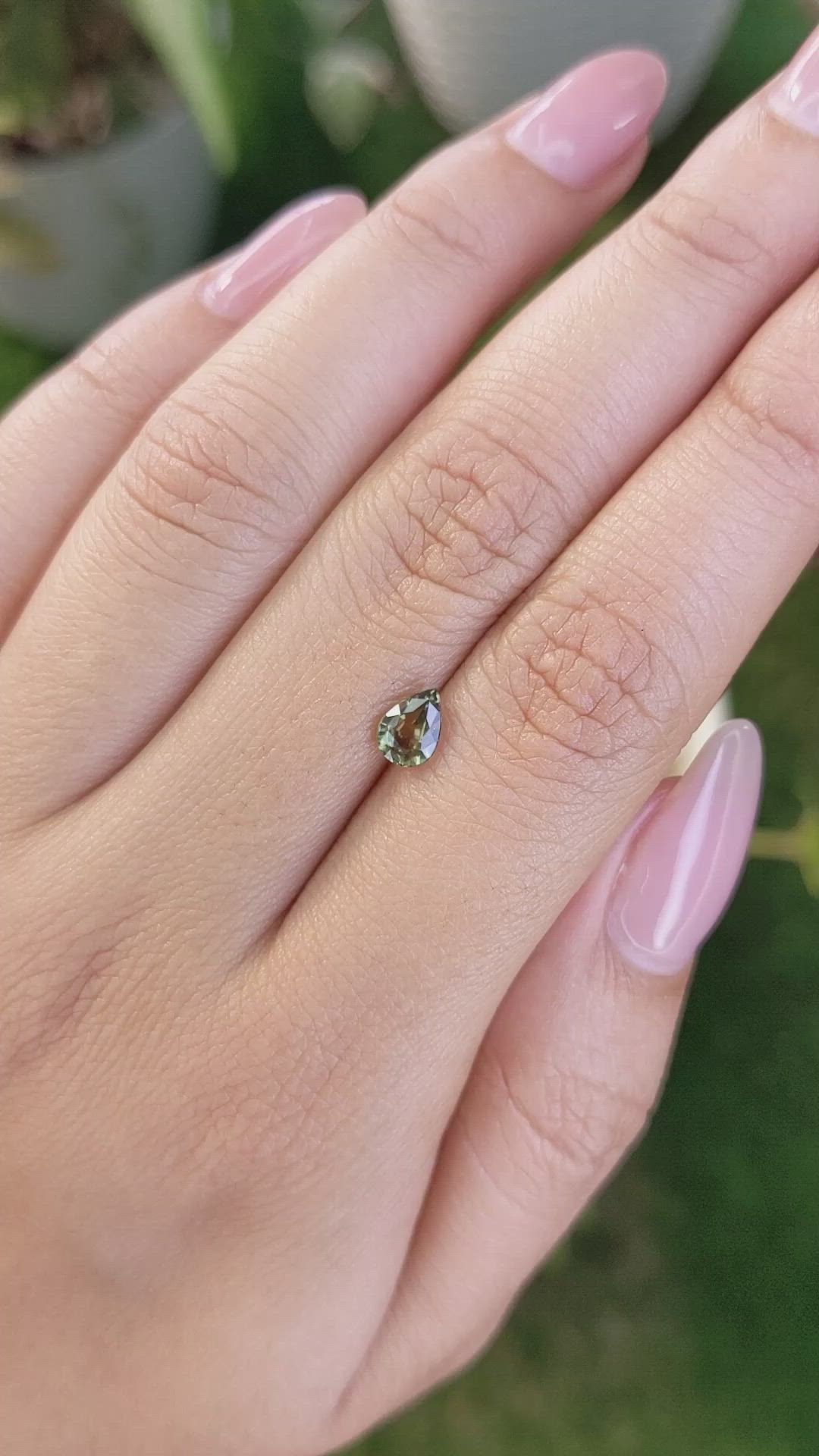 0.76 Ct. Greenish Yellow Sapphire from Madagascar Size Video