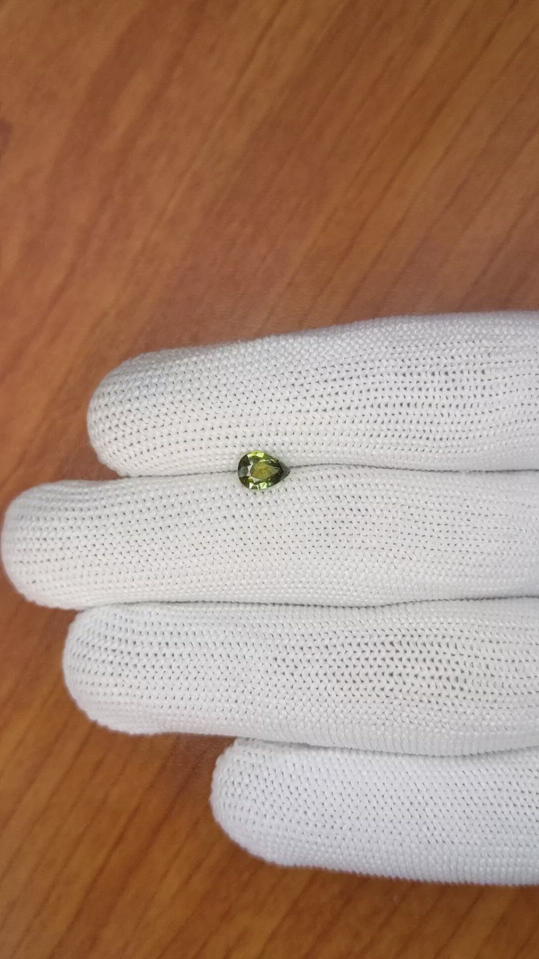 0.76 Ct. Greenish Yellow Sapphire from Madagascar Size Video