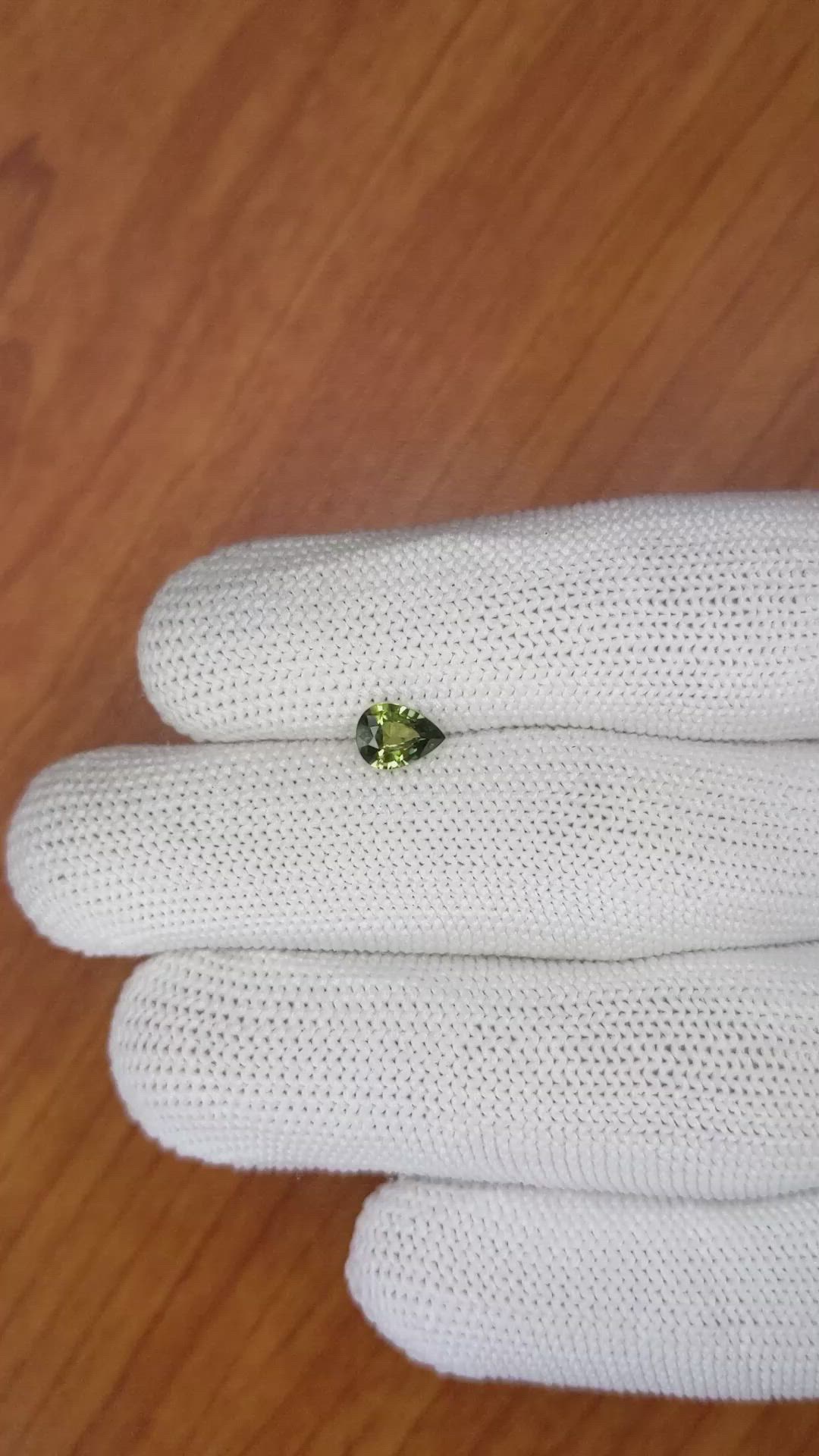 0.70 Ct. Yellowish Green Sapphire from Madagascar Size Video