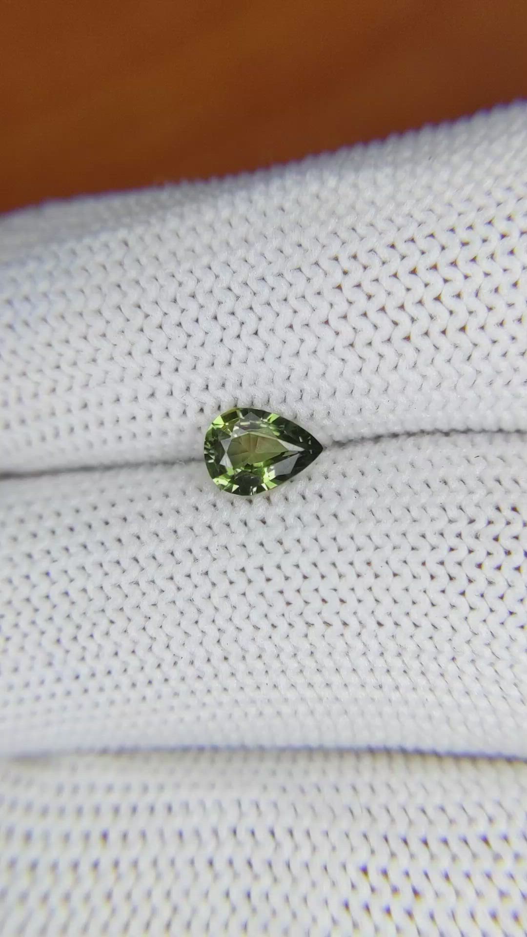 0.70 Ct. Yellowish Green Sapphire from Madagascar Size Video