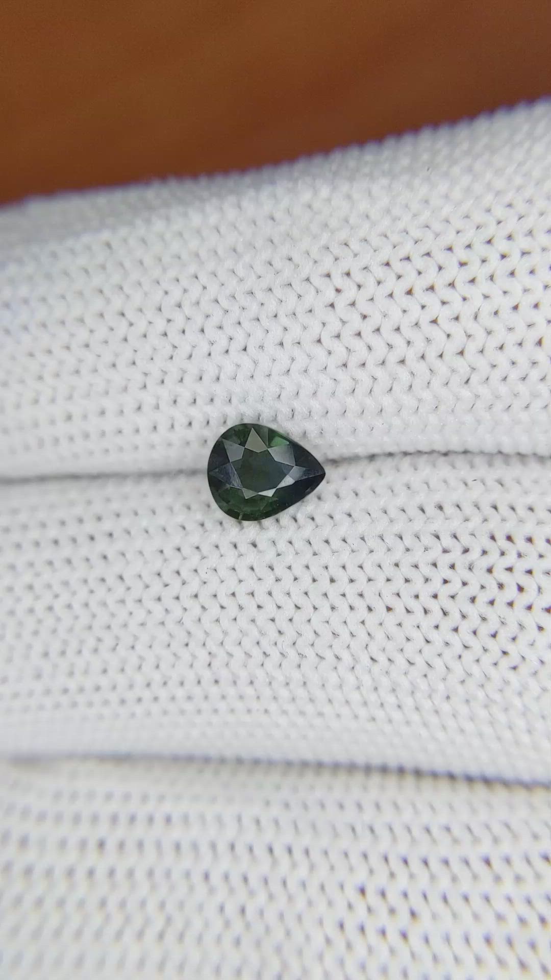 0.75 Ct. Bluish Green Sapphire from Madagascar Size Video