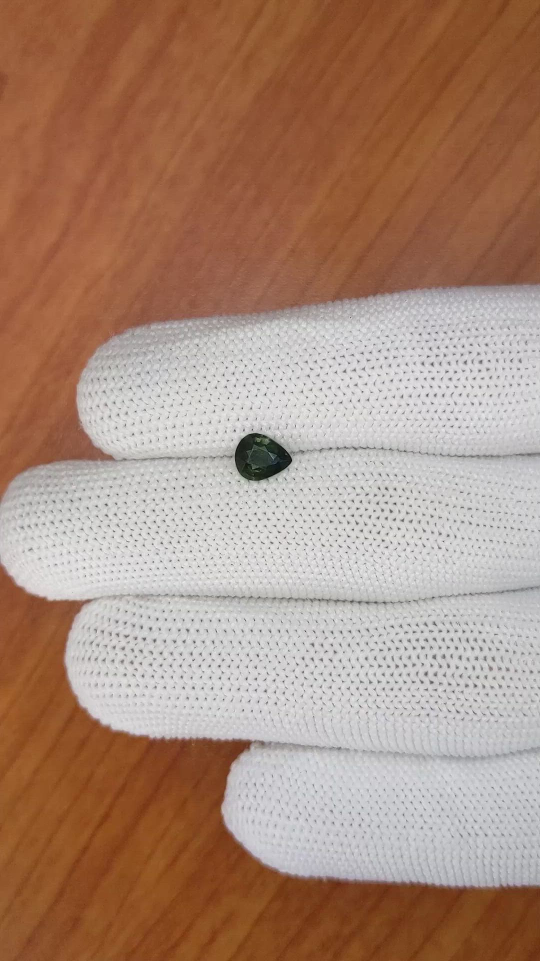 0.75 Ct. Bluish Green Sapphire from Madagascar Size Video