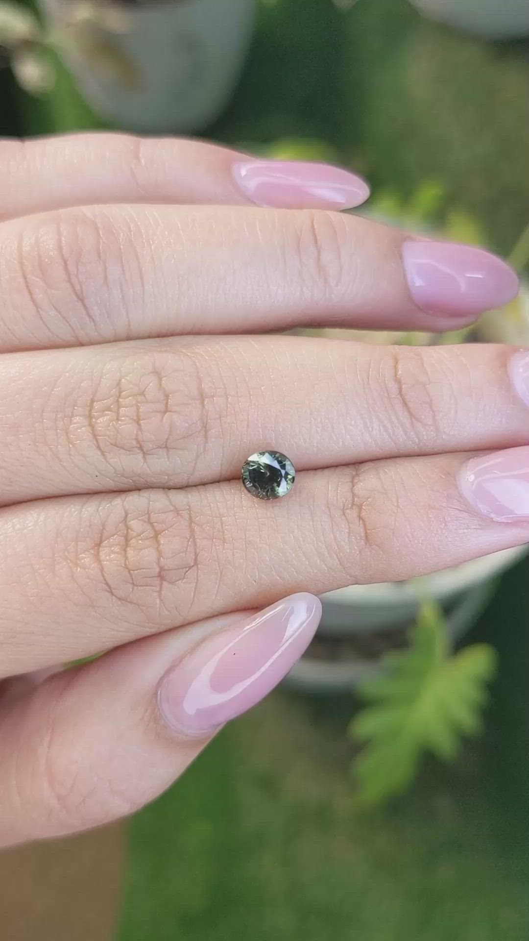 0.97 Ct. Yellowish Green Sapphire from Madagascar Size Video