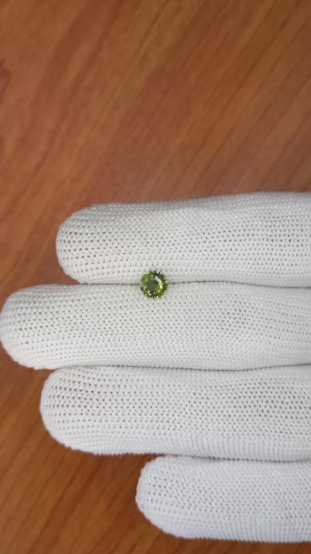 0.62 Ct. Yellowish Green Sapphire from Madagascar Size Video