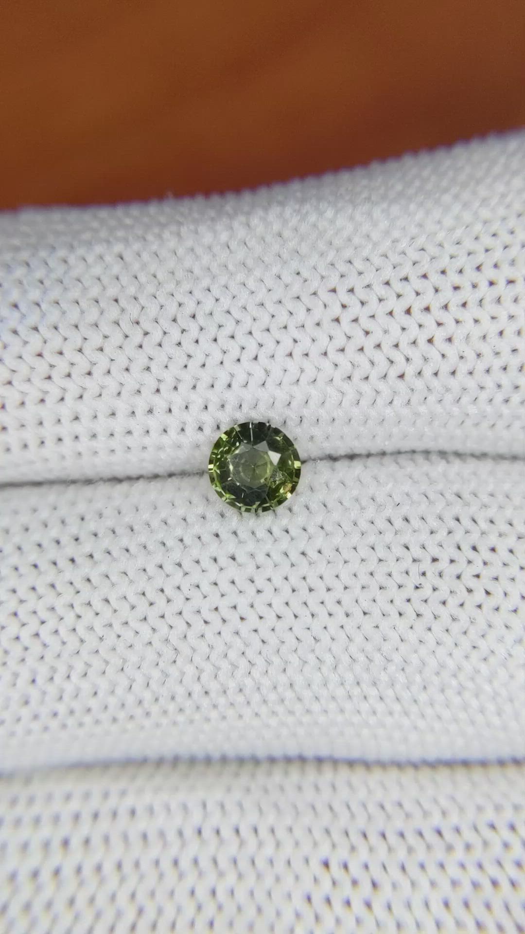 0.62 Ct. Yellowish Green Sapphire from Madagascar Size Video
