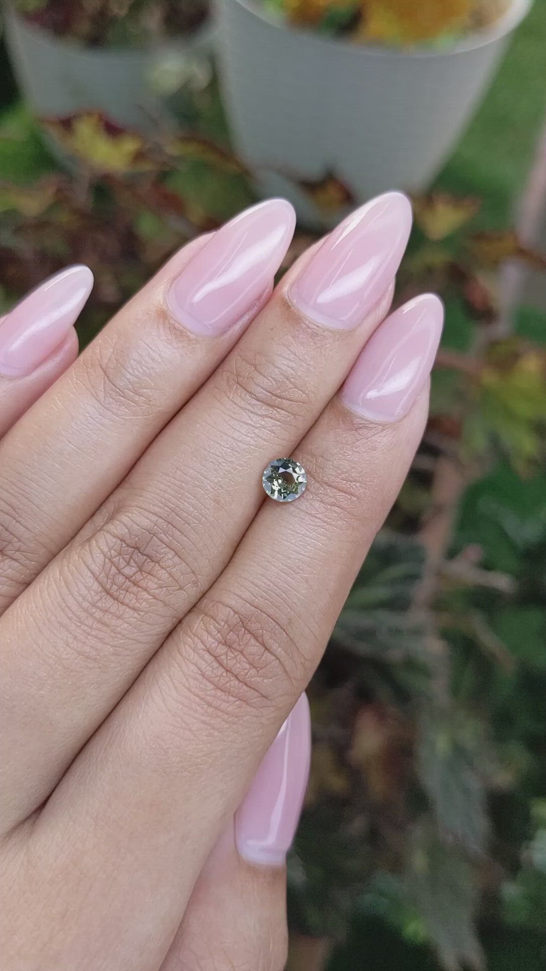 0.62 Ct. Yellowish Green Sapphire from Madagascar Size Video