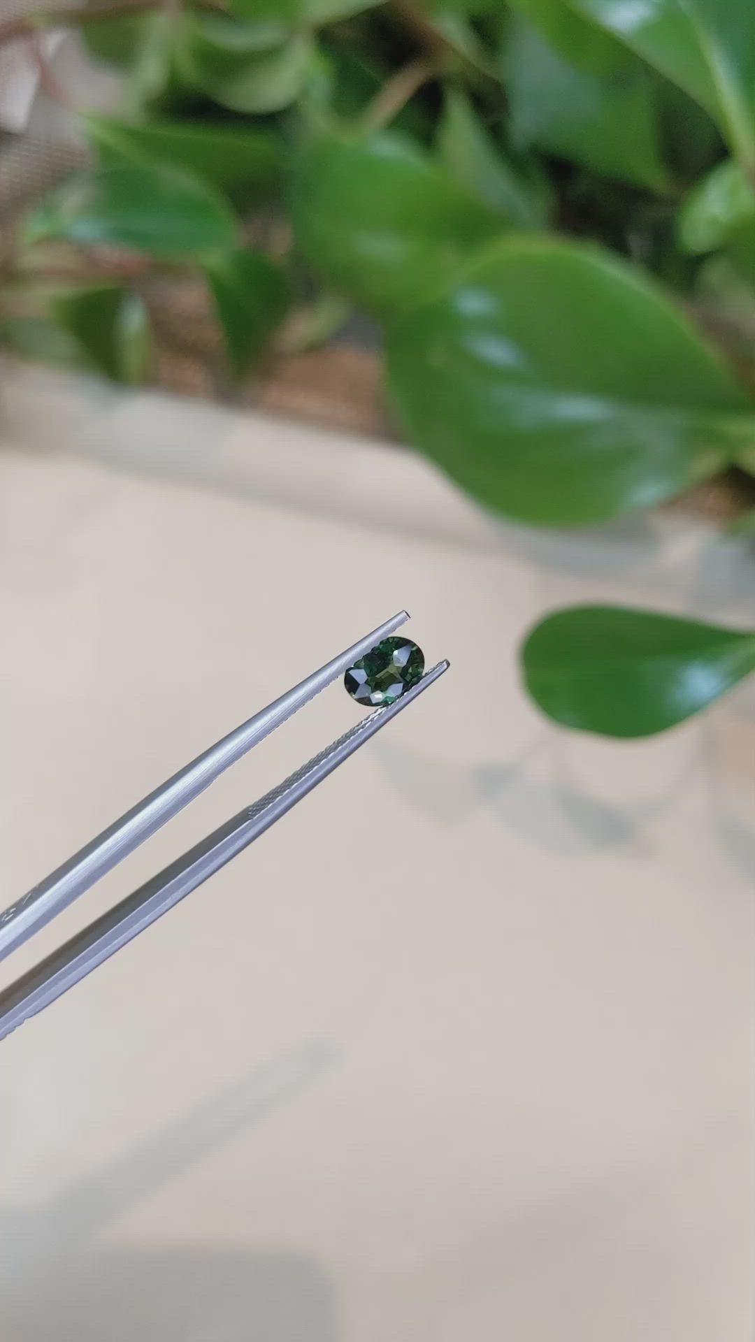 0.84 Ct. Bluish Green Sapphire from Thailand Size Video