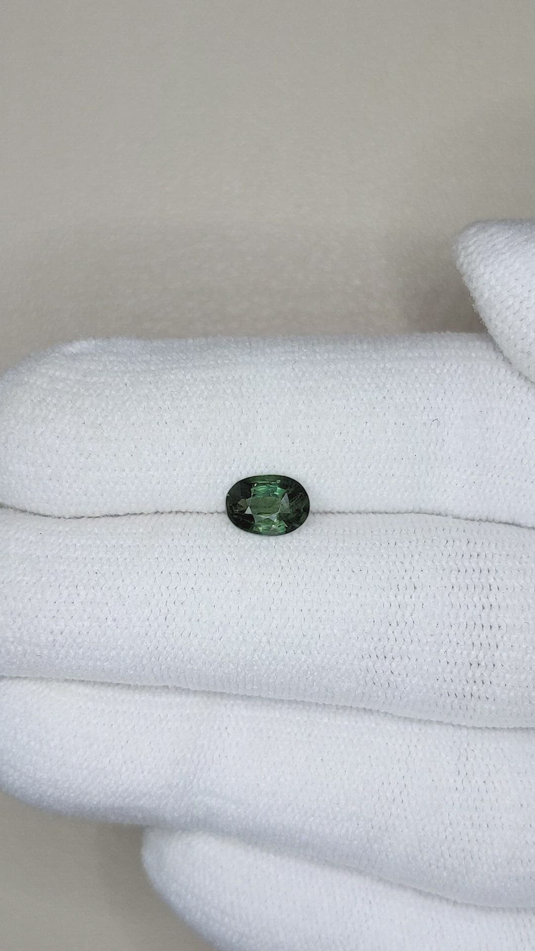0.84 Ct. Bluish Green Sapphire from Thailand Size Video