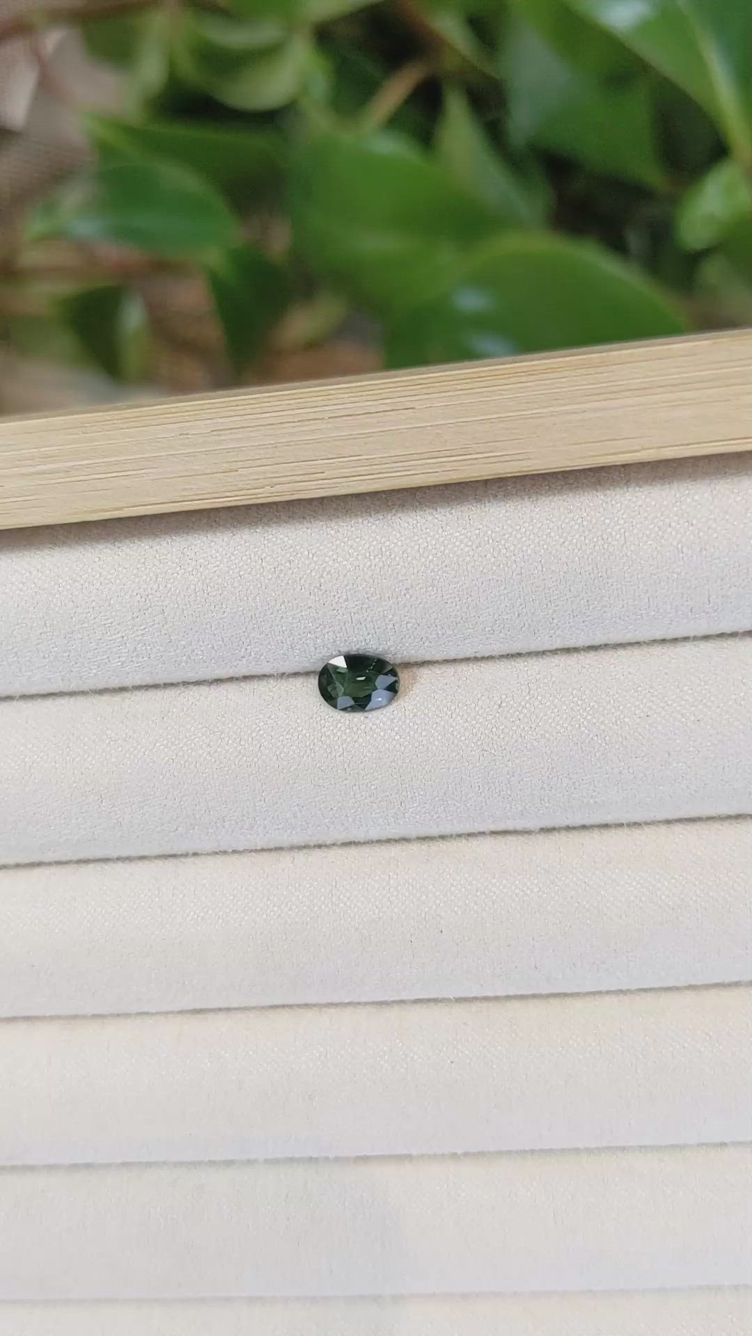0.84 Ct. Bluish Green Sapphire from Thailand Size Video