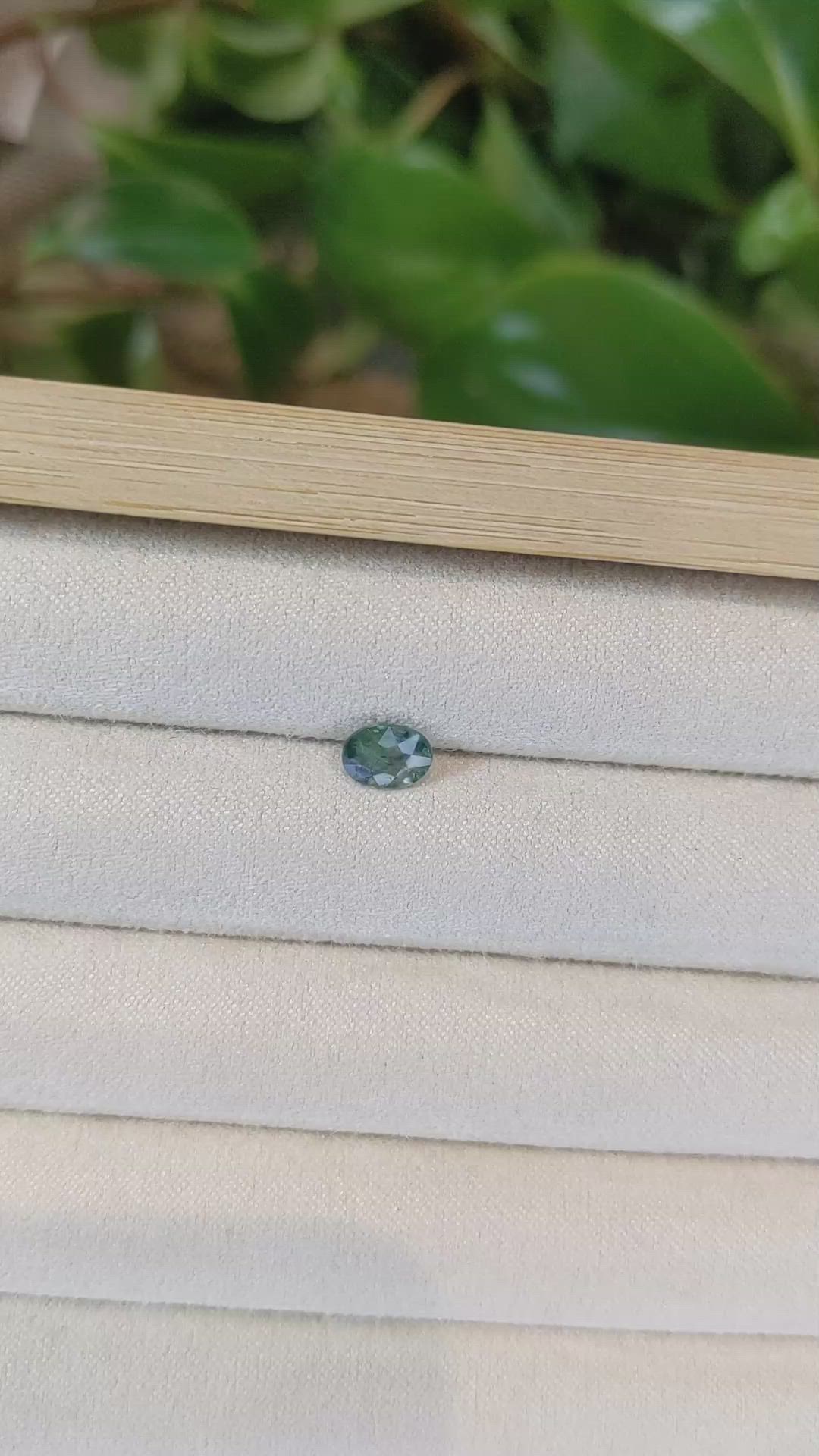 0.78 Ct. Bluish Green Sapphire from Thailand Size Video