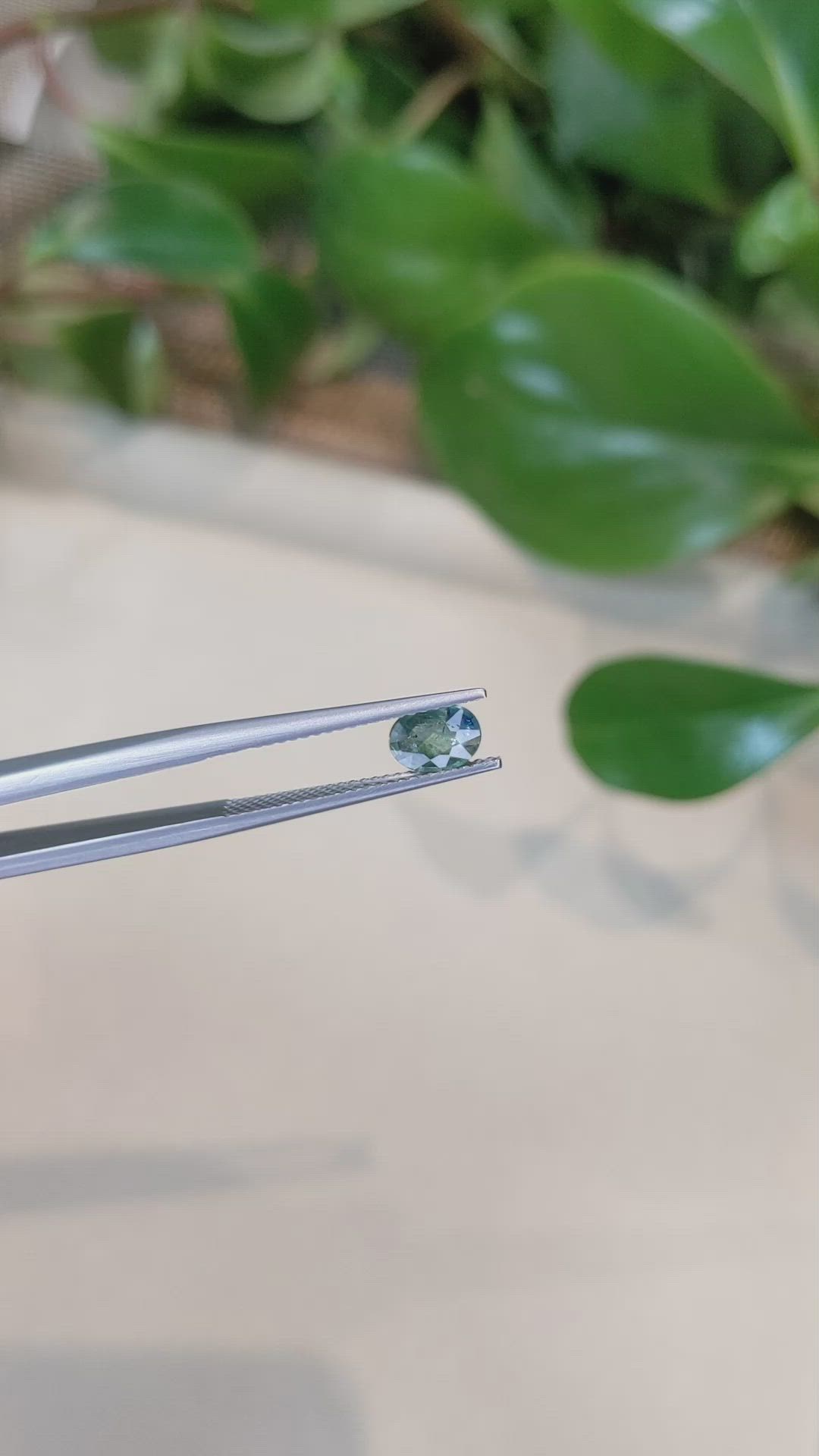 0.78 Ct. Bluish Green Sapphire from Thailand Size Video