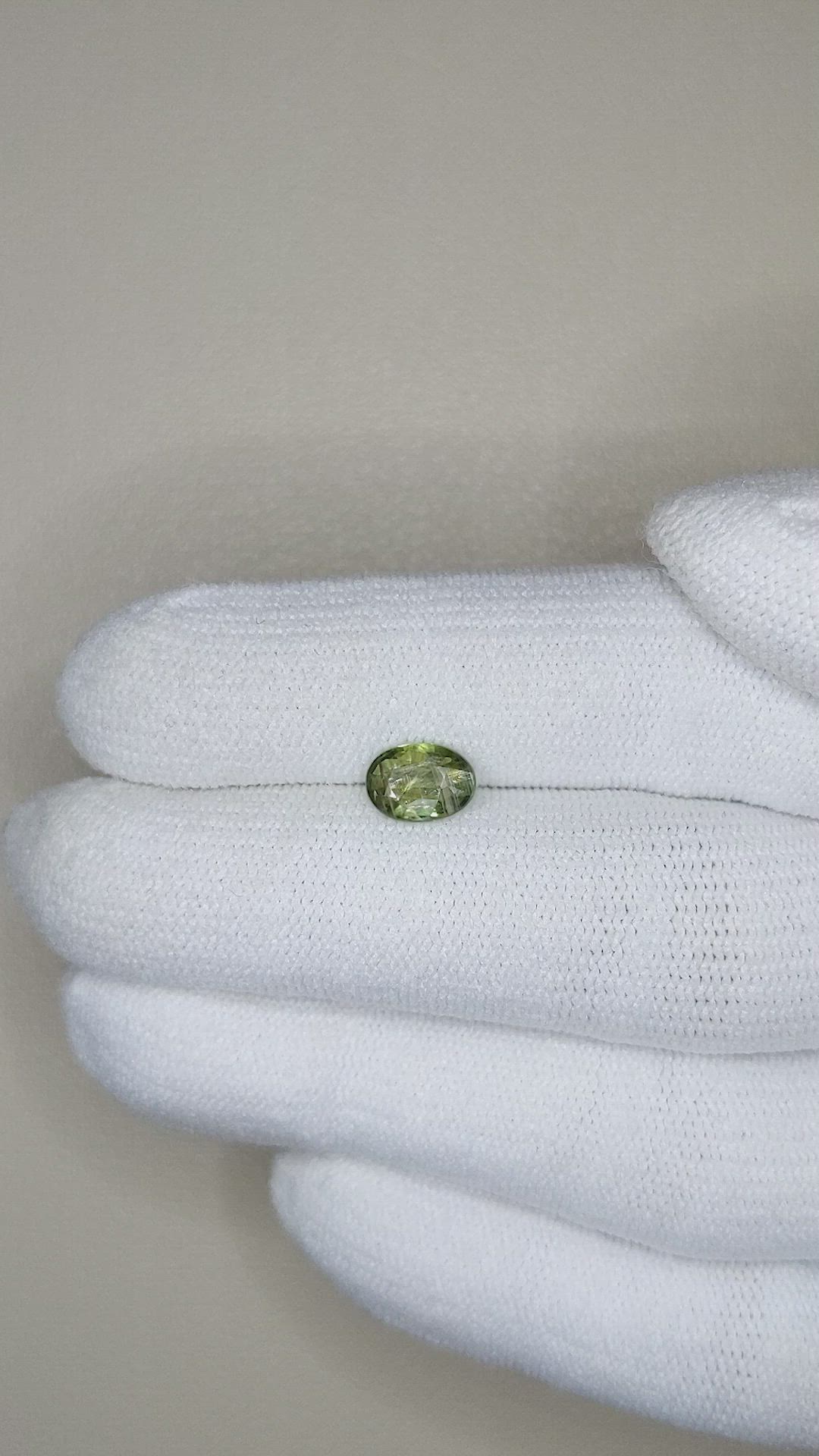 0.92 Ct. Yellowish Green Sapphire from Thailand Size Video
