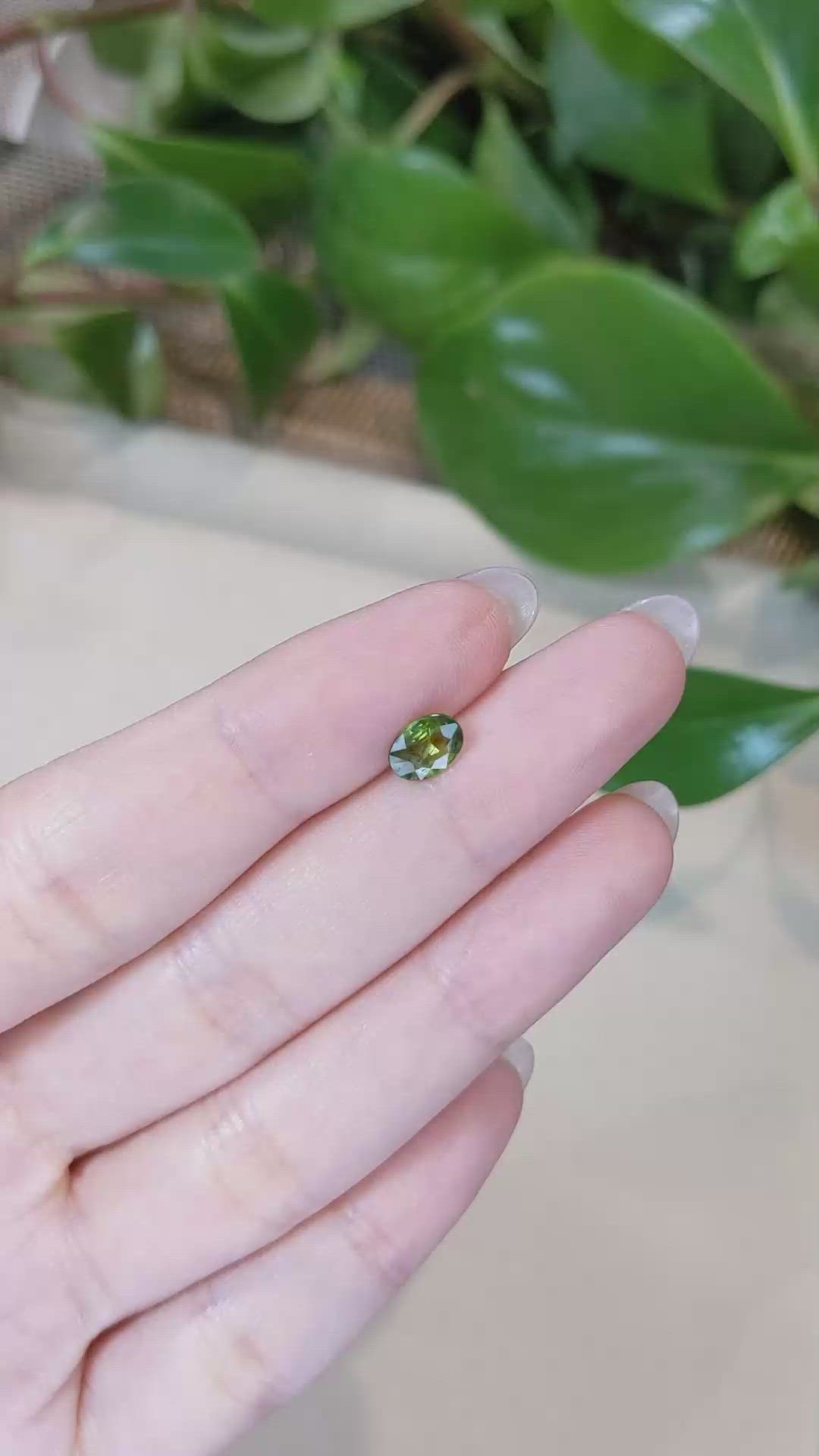 0.92 Ct. Yellowish Green Sapphire from Thailand Size Video