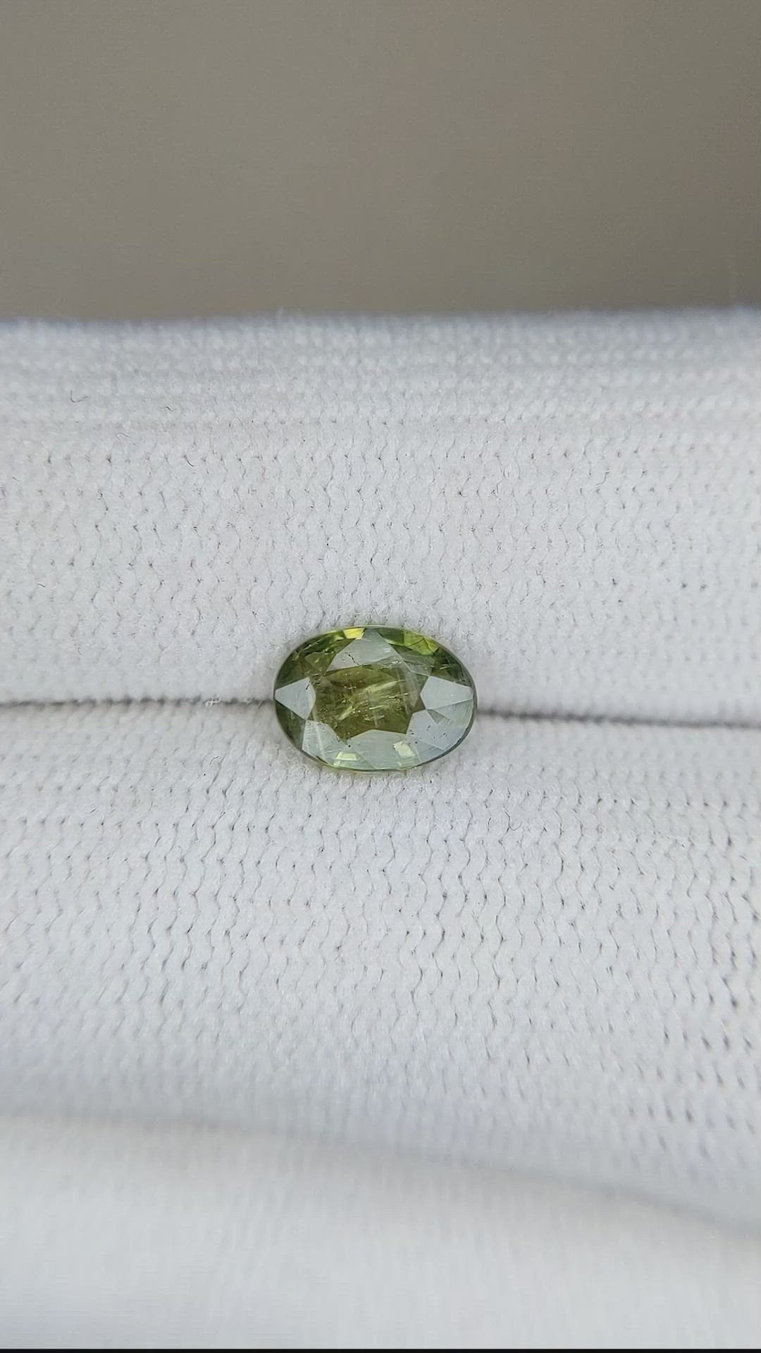 0.92 Ct. Yellowish Green Sapphire from Thailand Size Video