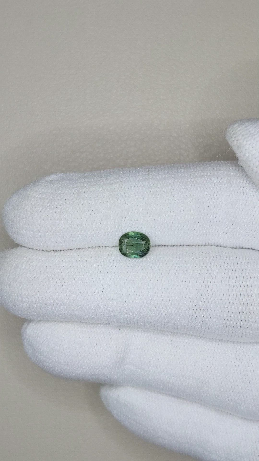 0.66 Ct. Bluish Green Sapphire from Madagascar Size Video