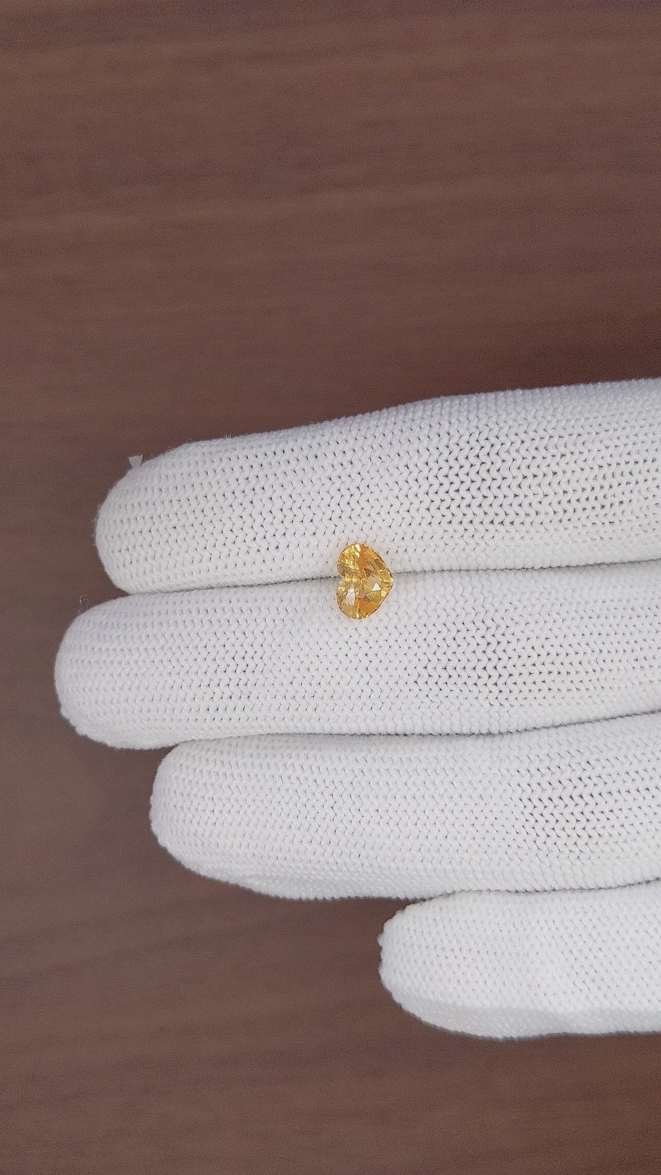 1.52 Ct. Orangish Yellow Sapphire from Africa Size Video