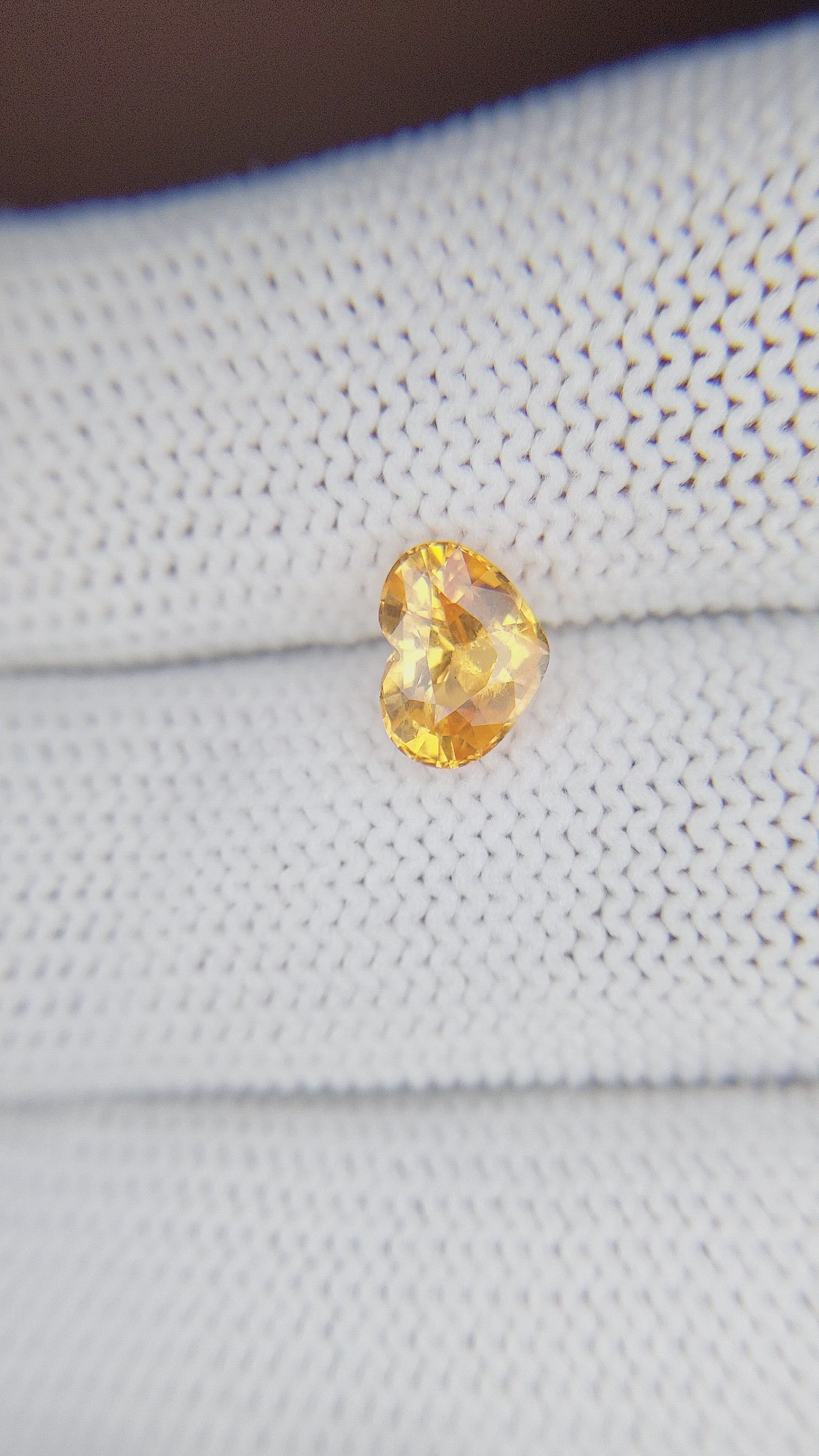 1.52 Ct. Orangish Yellow Sapphire from Africa Size Video