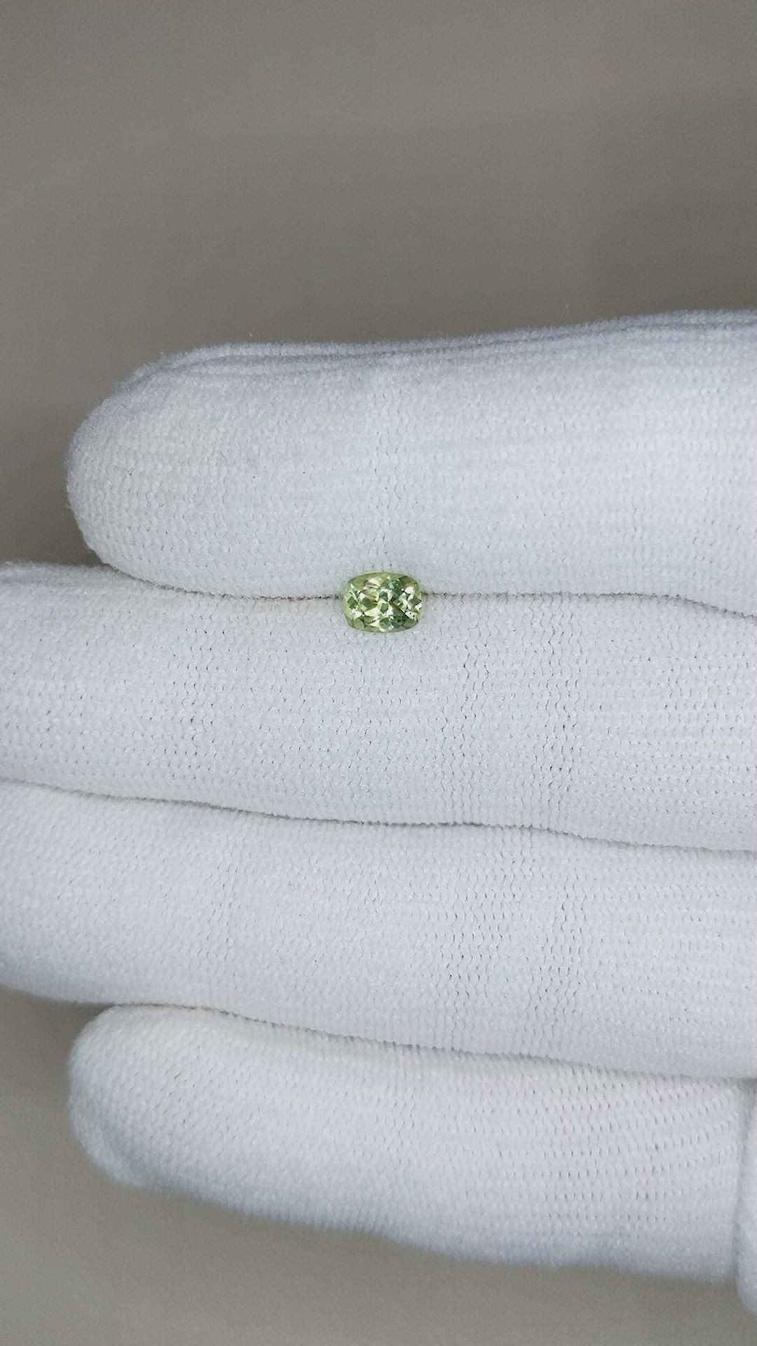 0.60 Ct. Yellowish Green Sapphire from Montana Size Video